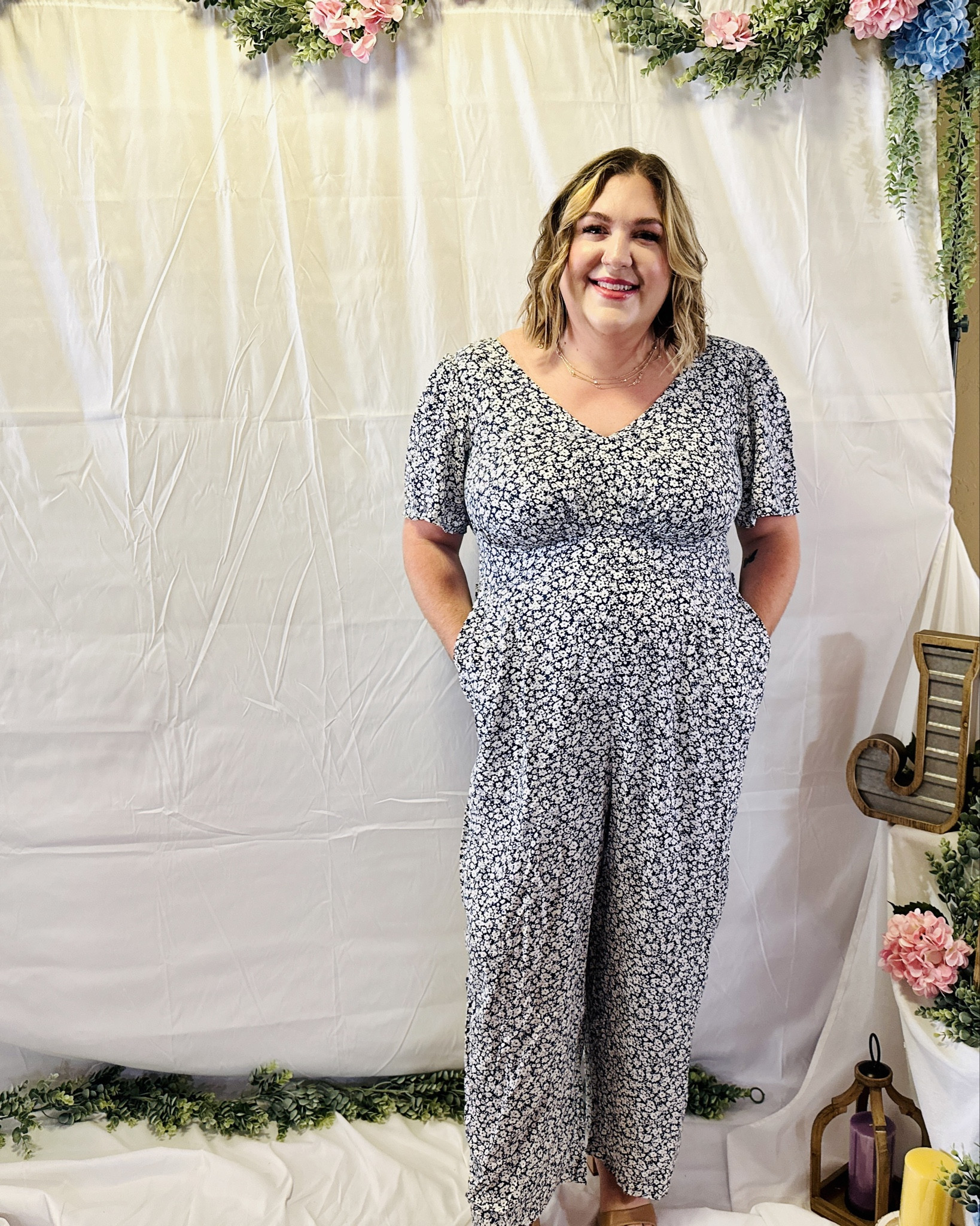 Love this blue floral jumpsuit for spring! The fabric is lightweight and perfect as it gets warmer this spring. This would be great for a wedding, church, work, date night and more! The fabric does not stretch but the back is smocked and stretches. I’m wearing a 2X and I’m 5’8” for reference. 

I’m also wearing the most comfortable block heels that come in wide widths and are under $25! 

#LTKplussize #LTKshoecrush #LTKsalealert