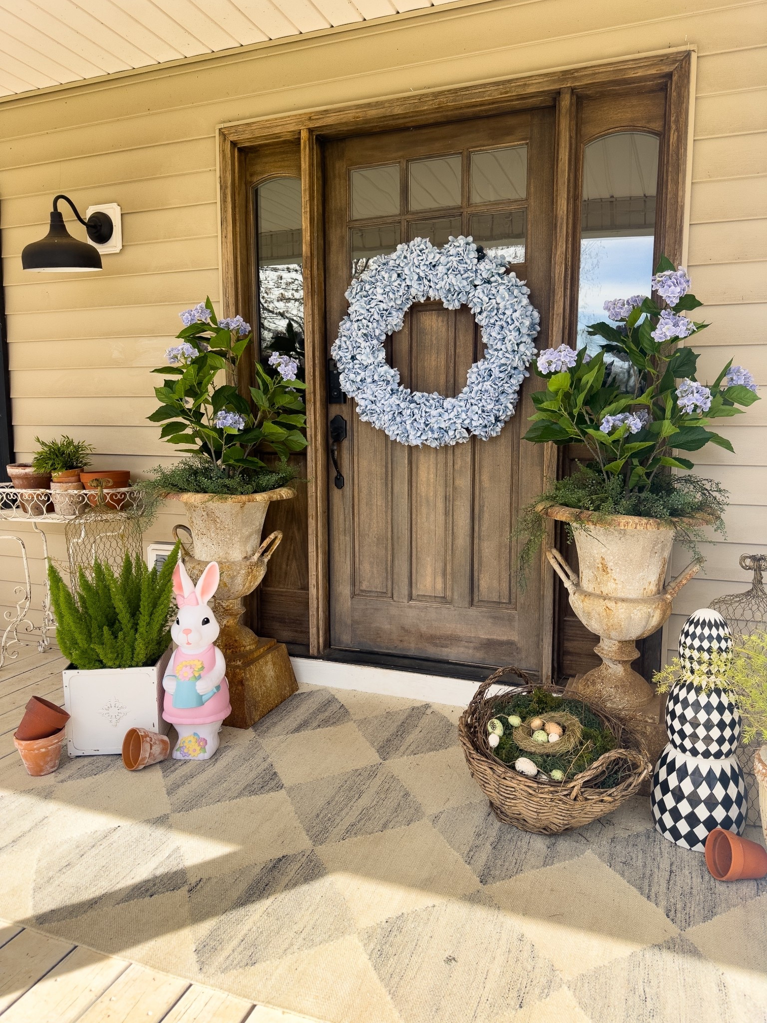Farmhouse cottage Easter front porch 

#LTKHome #LTKdayinmylife #LTKSeasonal