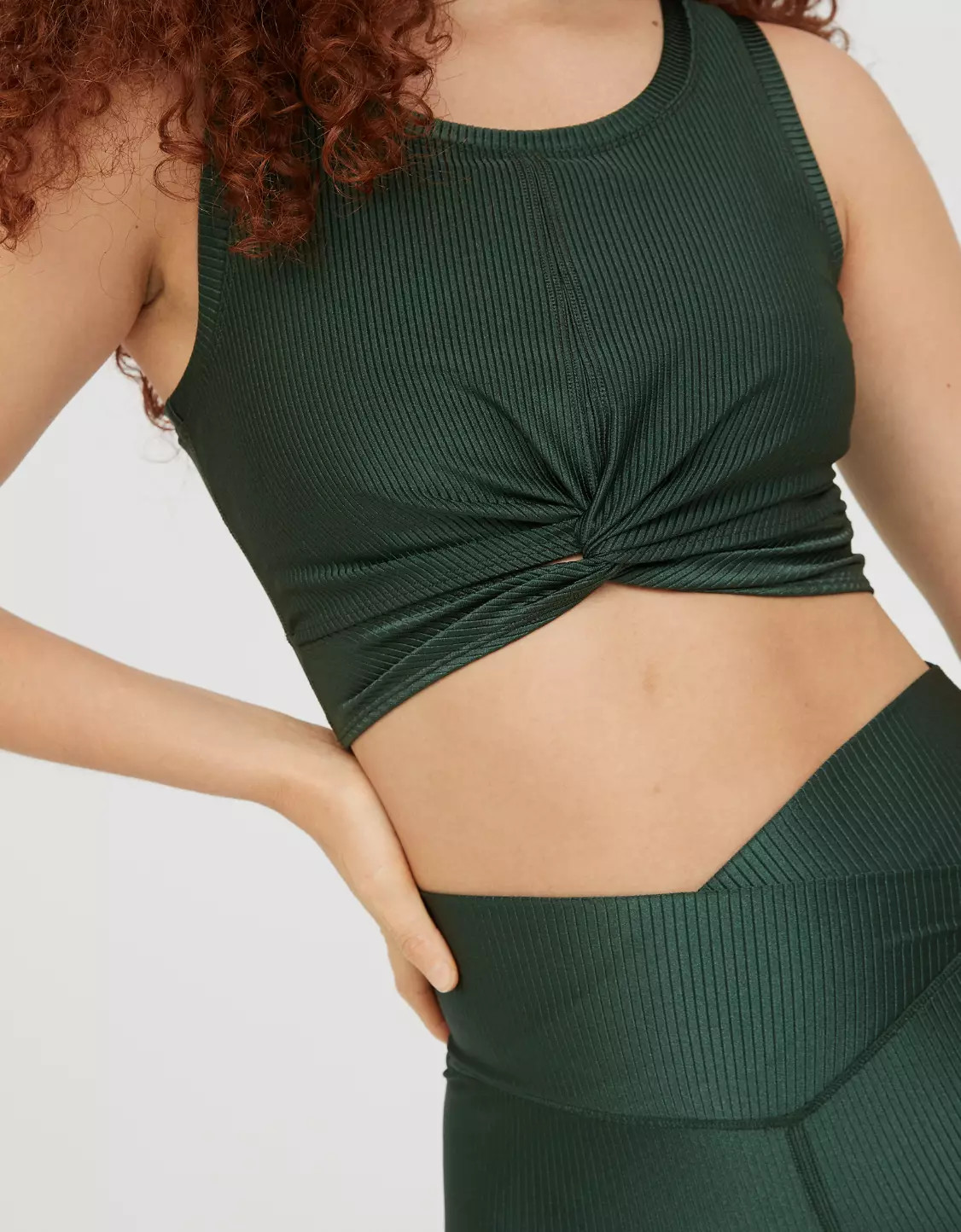 OFFLINE Ribbed Shine Twist Front Sports Bra | American Eagle Outfitters (US & CA)