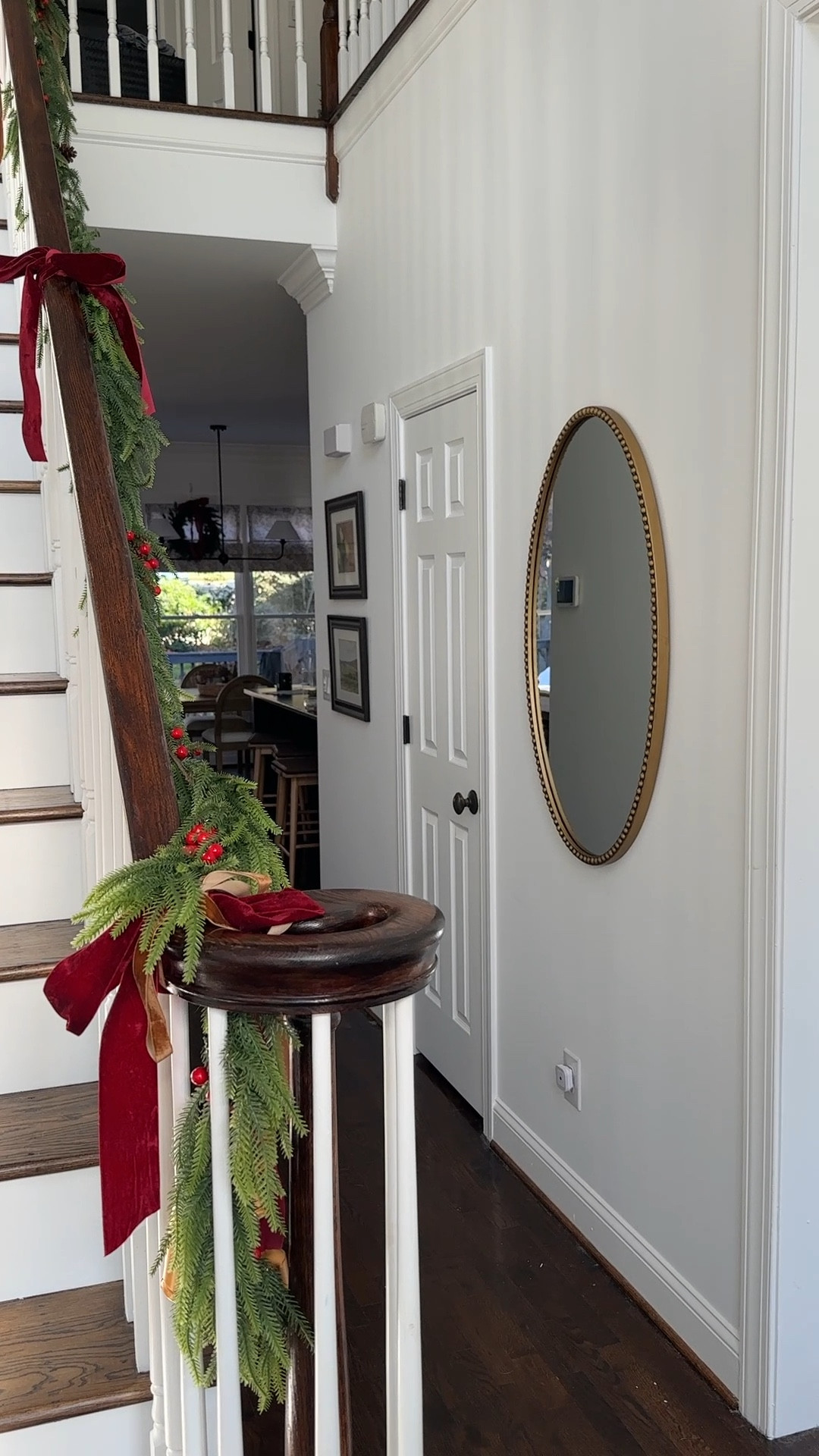 Holiday entryway, stair rail garland

#LTKFindsUnder100 #LTKHome
