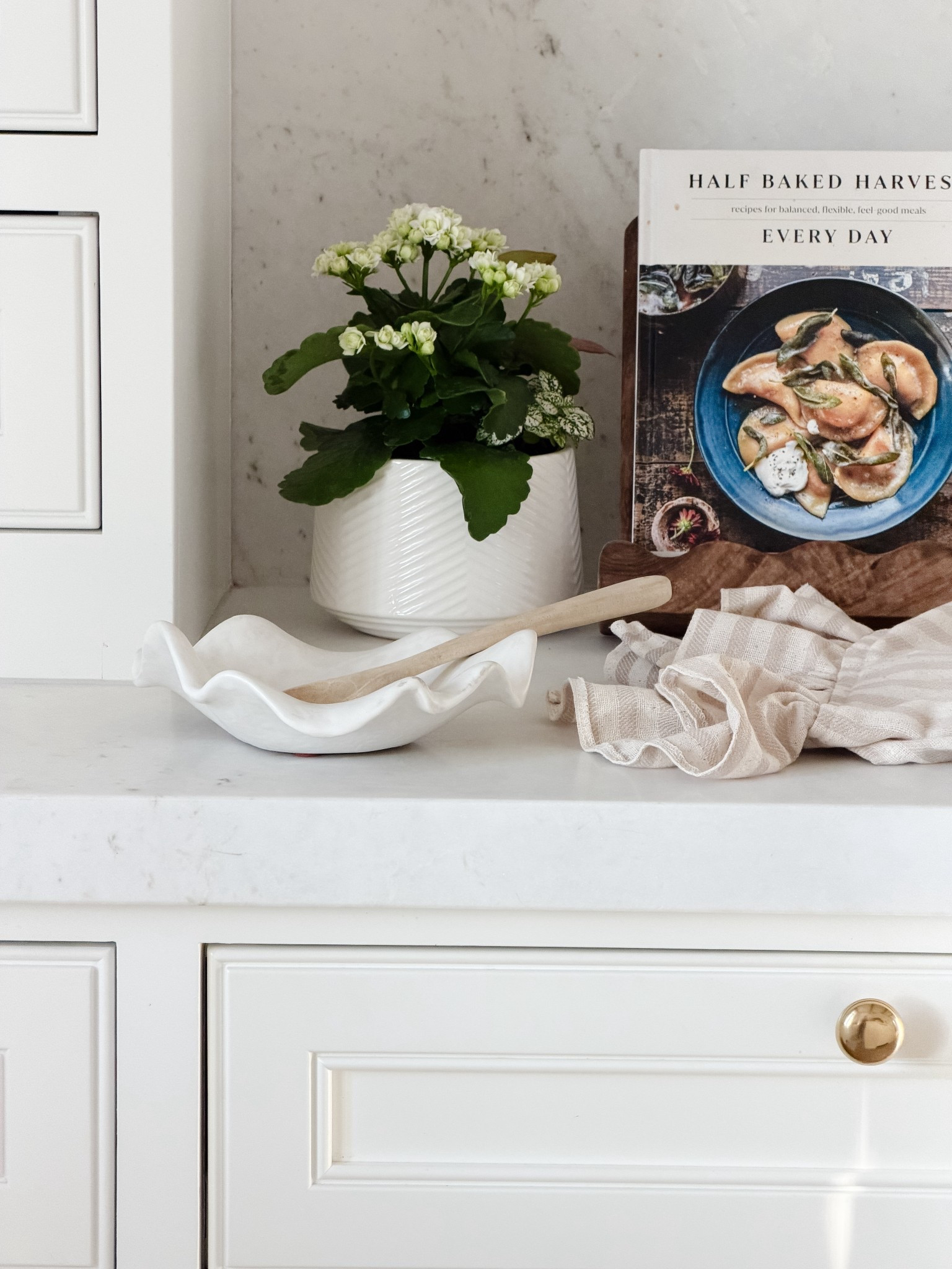 This little ruffled bowl is my newest find I love!  You can make it a spoon rest, candle holder, soap holder, catch all!  Love!

#LTKhaul #LTKHome