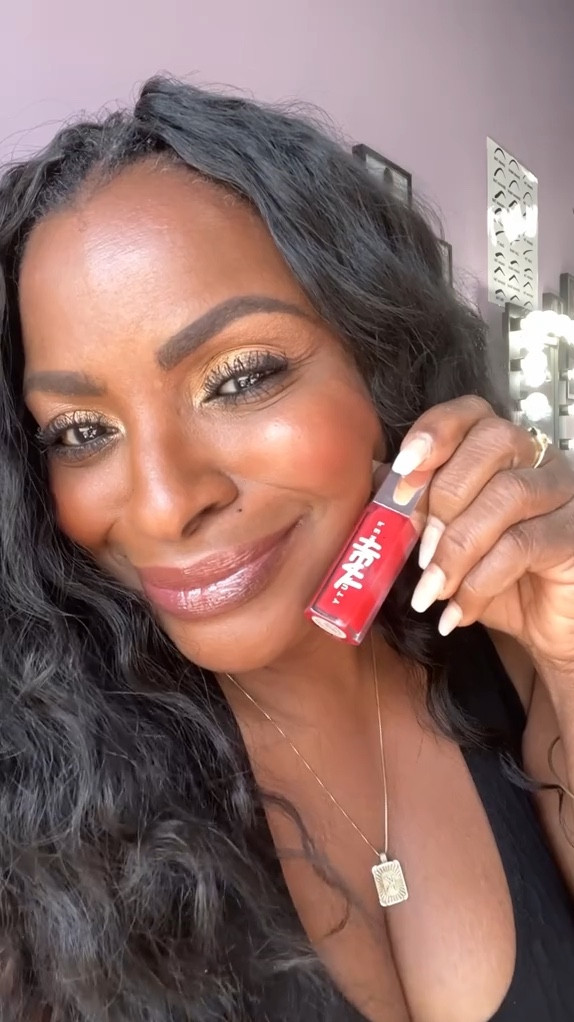 This Fenty Lip Gloss is a sheer red. Its's perfect for Summer days.

Adding a lipliner will make it pop more for a nighttime look. 

#LTKOver40 #LTKBeauty #LTKSummerSales