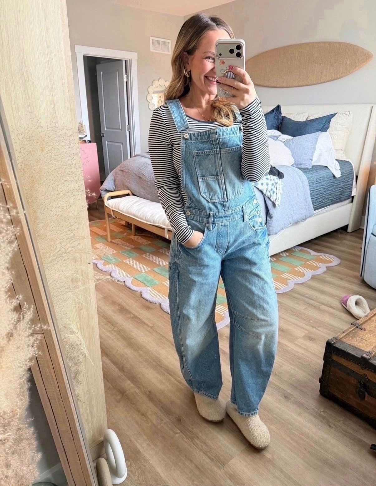 Okay this is peak effortless cool girl energy 👏🏼

Overalls are officially back and I’m not mad about it. These are the perfect relaxed fit — not too baggy, not too stiff — and they layer so well over a simple striped long sleeve. Easy, comfortable, and somehow still looks styled.

Wearing with cozy slippers here, but you could swap for sneakers or clogs and instantly change the vibe.

Fit notes:
• True to size
• Soft denim with structure
• Relaxed wide leg (so flattering)

Linking the overalls, striped tee, and slippers here 🤍 This is one of those outfits you’ll keep reaching for.