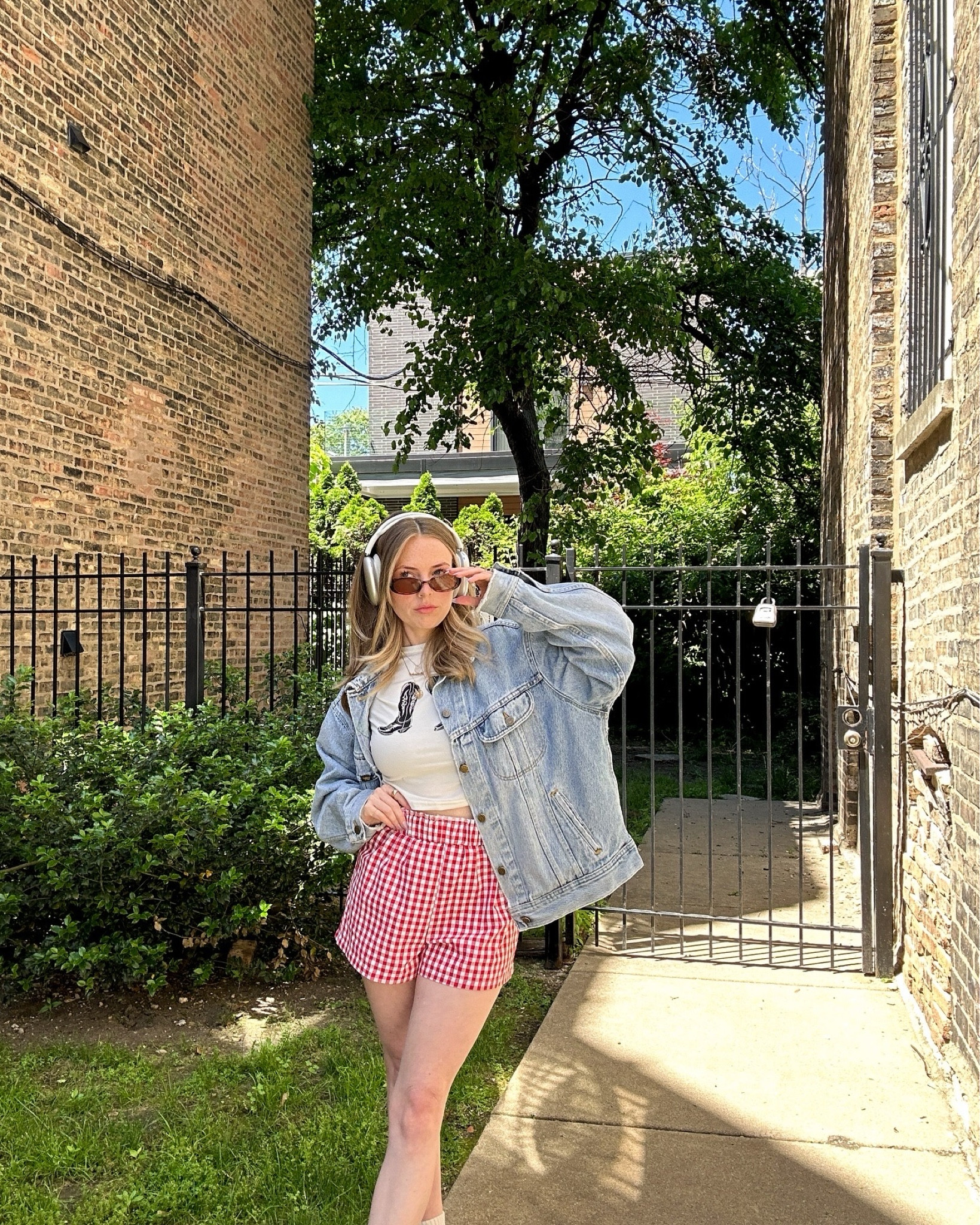 Jean jacket, gingham boxer shorts, baby tee, cowboy boots, casual style 

#LTKStyleTip #LTKFindsUnder50