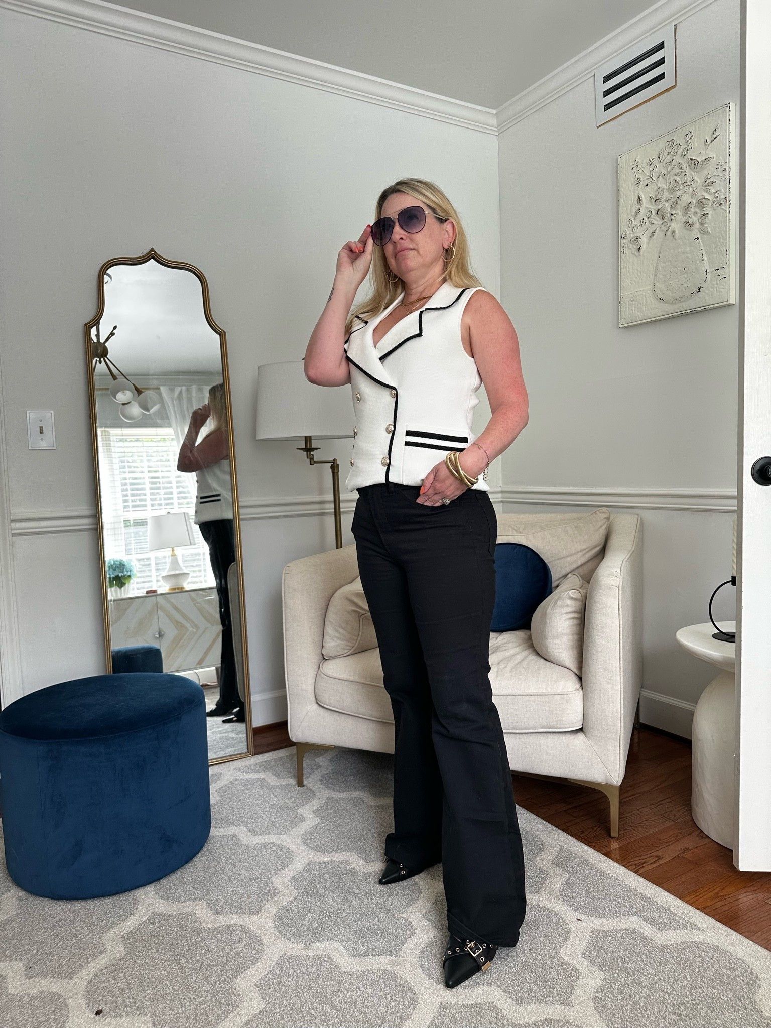 Today’s polished casual look for errands, meetings, and real life. This contrast trim vest is such a chic elevated basic and looks so good paired with black trousers or denim. Perfect for petites wanting a more balanced silhouette.

Vici code it trilbysave35 
The top runs large so size down! I’m wearing a small

#LTKootd #LTKWorkwear #LTKPetite