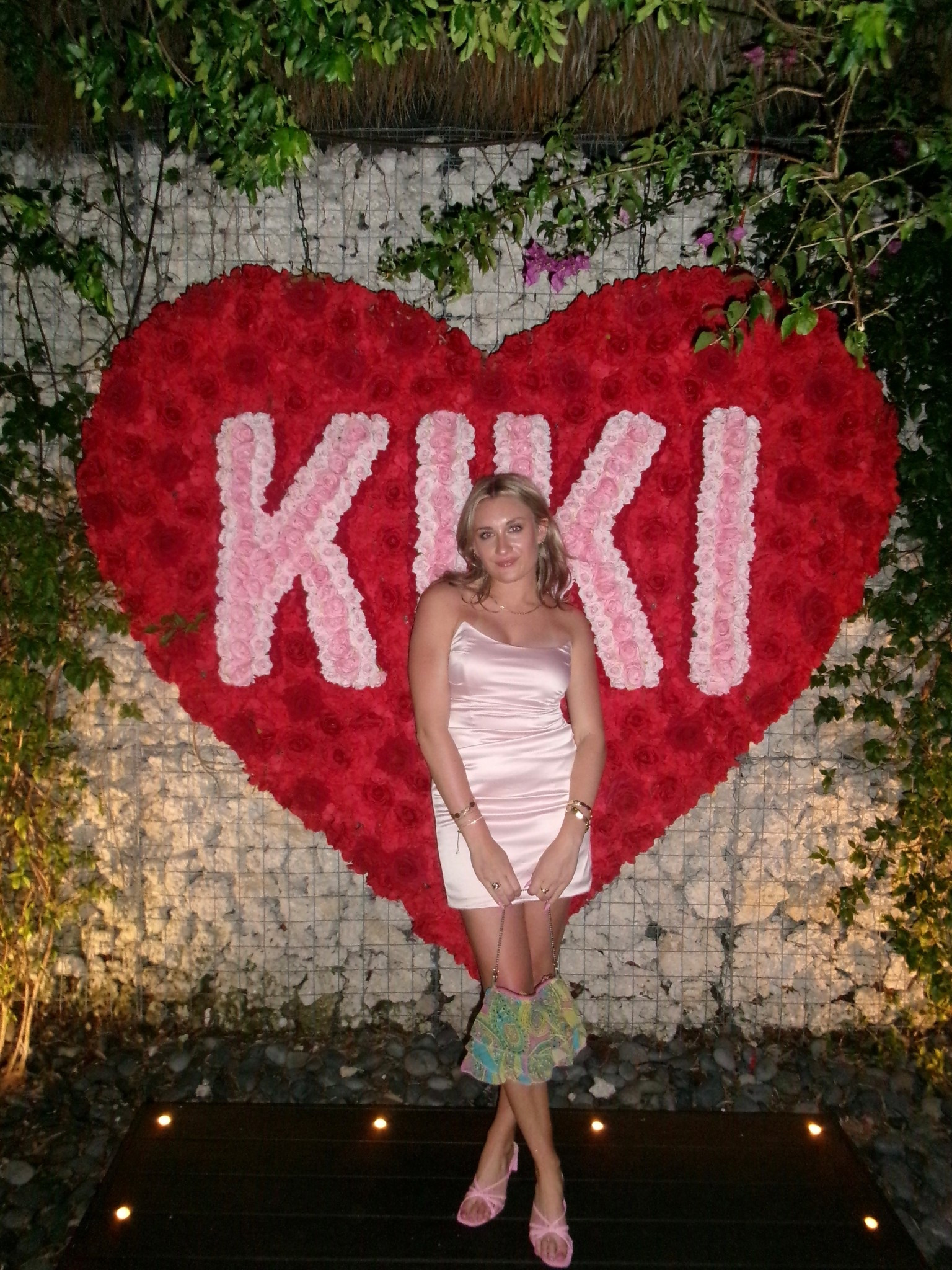 Of course, I had to match the sign! Going to Kiki’s I wanted to wear a fun and flirty pink dress. This one is a staple- I wear it everywhere! I leaned into the pink theme and matched my mom’s vintage gap purse and some pink heels. I kept cool on the patio and felt hot 😉

#LTKParties #LTKTravel