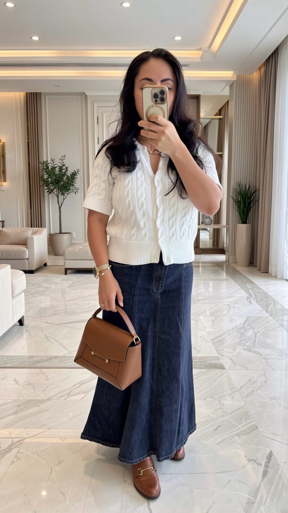 Fit check 🤍 Serving a polished everyday sustainable look ✨

This short-sleeve white cotton cardigan is the definition of a wardrobe staple—classic, versatile, and easy to style up or down. Paired it with this seamed tulip flared denim skirt that gives such a flattering, flirty silhouette (major upgrade from your typical front-slit midi).

Both pieces are rented from @renttherunway — wear it, love it, return it 💁🏽‍♀️

Use my code RTRXDESI to get 60% off your first month 🤍

Finished the look with my go-to loafers from J.Crew Factory and a structured handbag from Strathberry for that effortless, put-together feel.

Would you style this with boots or keep it classic like this? 👀

#LTKootd #LTKPetite #LTKOver40