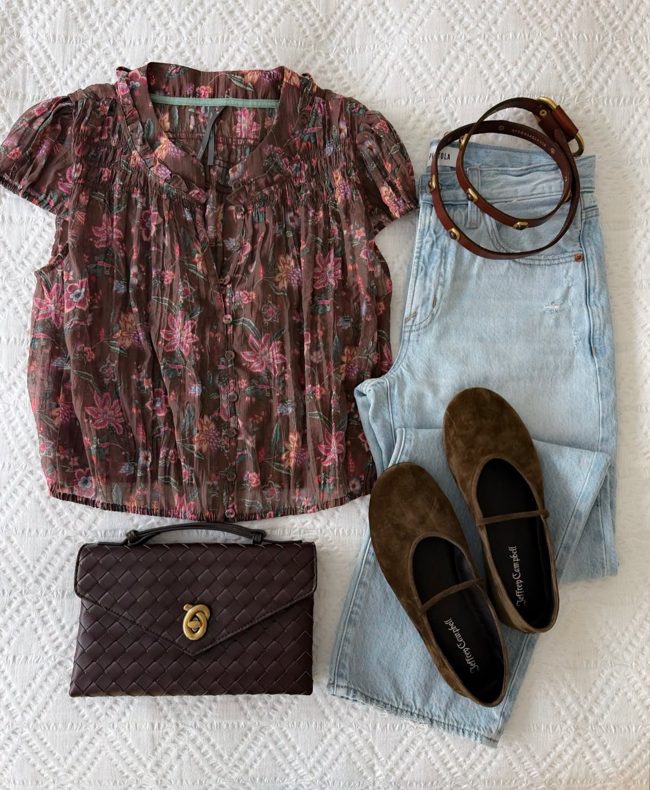 The colors in this blouse are exactly where my mind is for early fall. I love the soft floral print with light wash denim, then adding chocolate brown Mary Janes and a woven bag to pull out those deeper tones.

floral blouse, fall blouse, light wash jeans, mary jane flats, chocolate brown accessories, woven handbag, early fall outfit, transitional style, casual fall fashion, fall color palette, annabrstyle

#LTKSeasonal #LTKOver40 #LTKootd