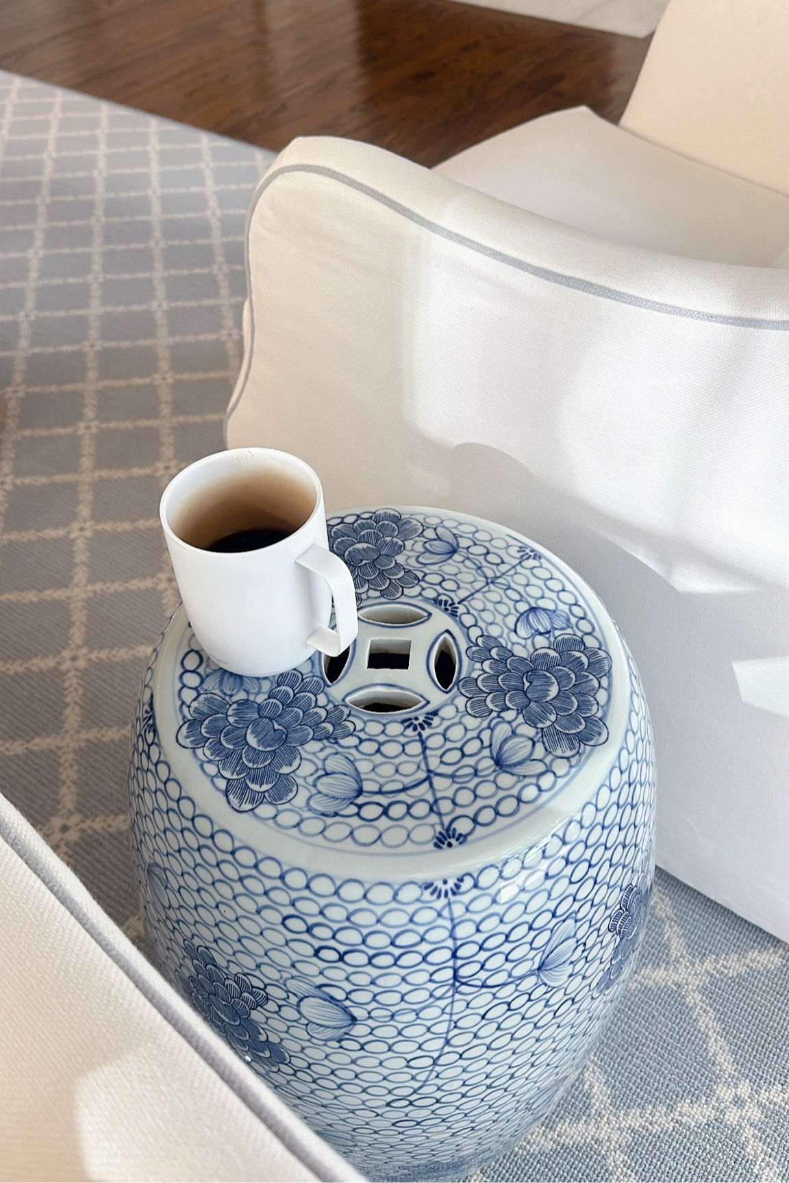 The prettiest garden stool for in between our swivel chairs in our living room!