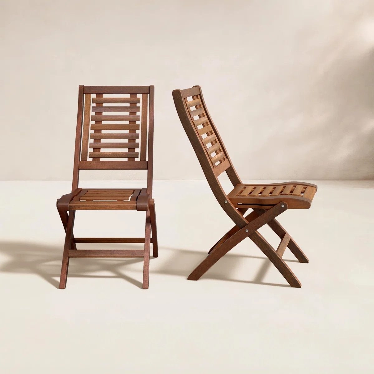 This 2-piece set of folding side chairs brings a classic look to your patio or poolside. They're ... | Wayfair North America