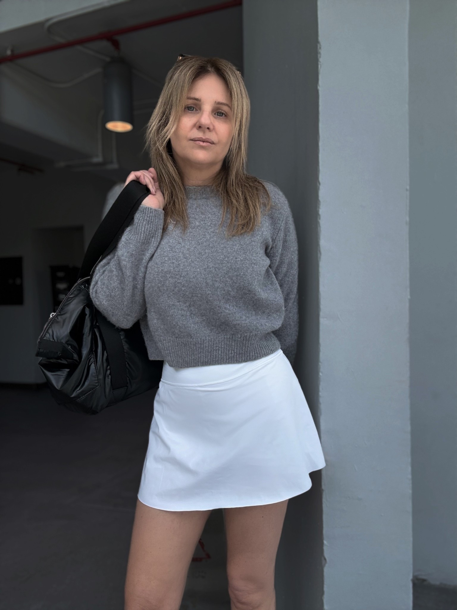 Closer look at the skirt, sweater coverup from yesterday. Wearing a flat front, no pleats skort from Athleta size: S, length 13.5” w my Sporty & Rich cashmere cropped sweater and a shiny black tote bag. Athleisure / post-tennis, Padel, pickleball outfit.

#LTKSeasonal #LTKActive #LTKfitnessgoals