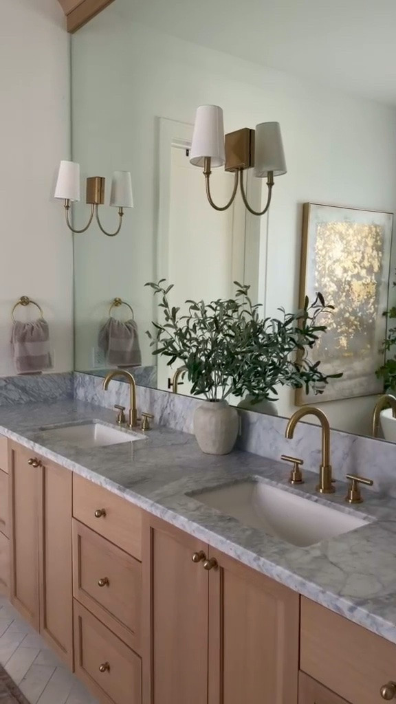 I’m linking the bathroom details I reach for daily, from the brass faucets and hardware to the lighting and accessories.

I chose each piece for the warm tone and simple lines that layer easily with the marble and wood. Everything feels cohesive, functional, and easy to live with.

Sharing it all here if you’re building a bathroom that feels calm, classic, and well finished.
@Wayfair 
@lowes 
@Thehomedepot

#LTKU #LTKSaleAlert #LTKHome