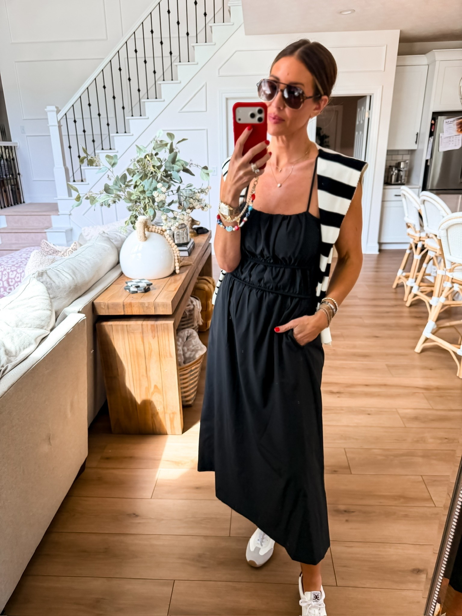 This black midi dress is the definition of effortless chic. I love how versatile it is, pair it with sneakers for an elevated everyday look or dress it up with sandals and accessories for dinner or vacation nights. The striped sweater draped over the shoulders adds the perfect classic touch.

black midi dress, summer dress outfit, casual chic style, vacation outfit, everyday dress, sneaker outfit, timeless fashion, capsule wardrobe, black dress styling, resort wear, effortless style, summer wardrobe staple, themominstyle

#LTKSeasonal #LTKOver40 #LTKootd