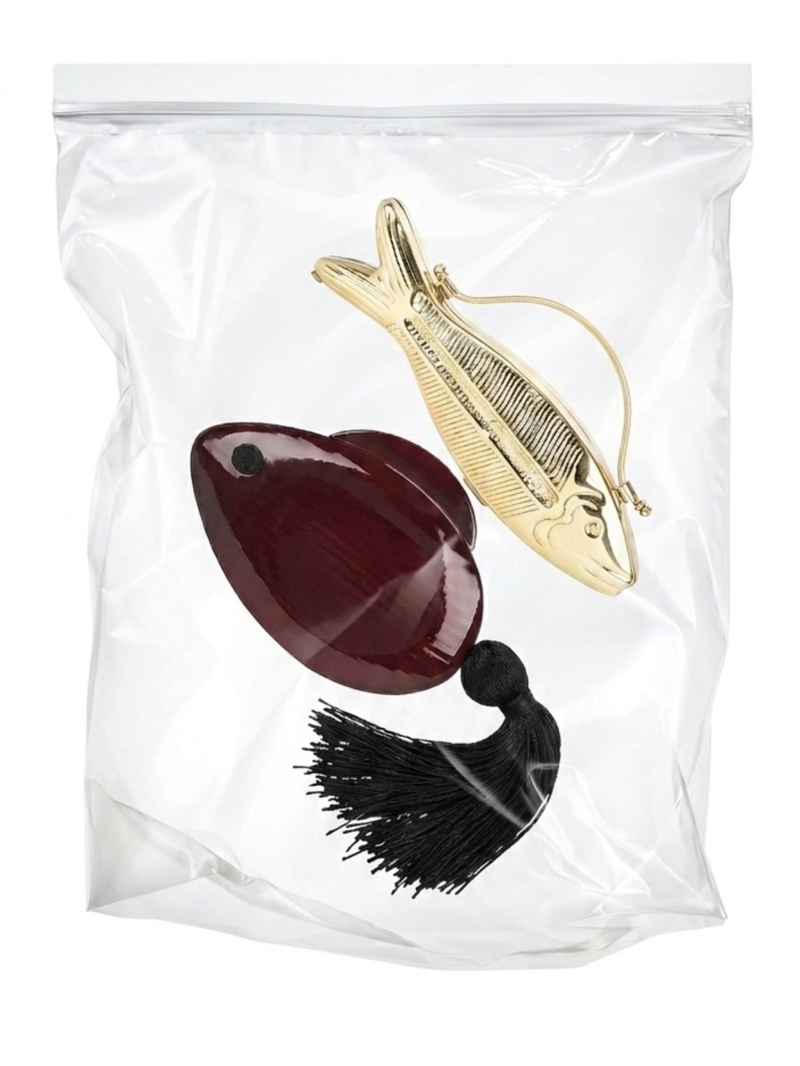 Bagging up the hottest bags this week. Fish clutches

#LTKootd
