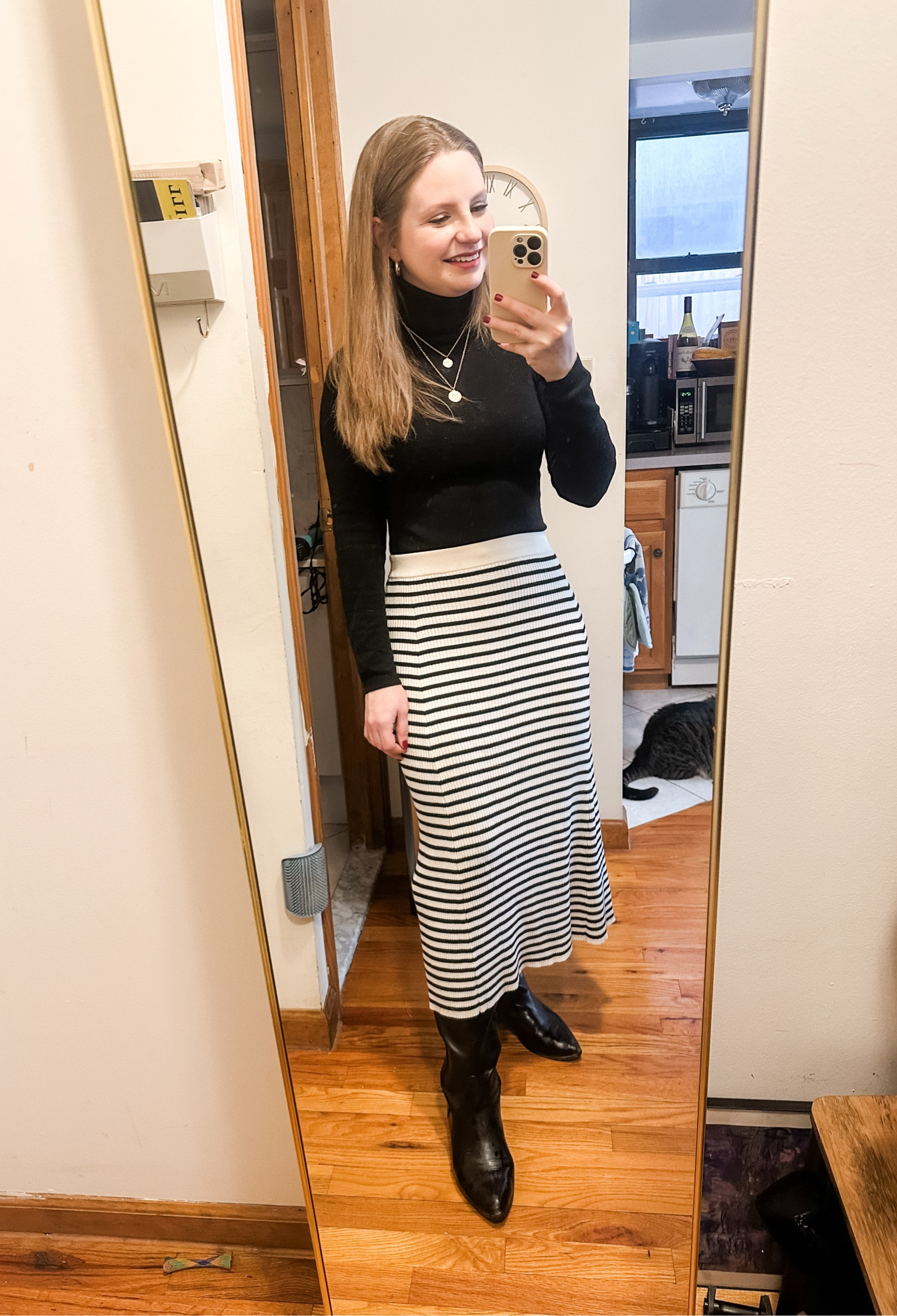 Remixed some old wardrobe favorites for this chic winter work look! Black turtleneck + striped sweater skirt + black tall boots

Winter outfit 
Work outfit 

#LTKStyleTip #LTKSeasonal #LTKWorkwear