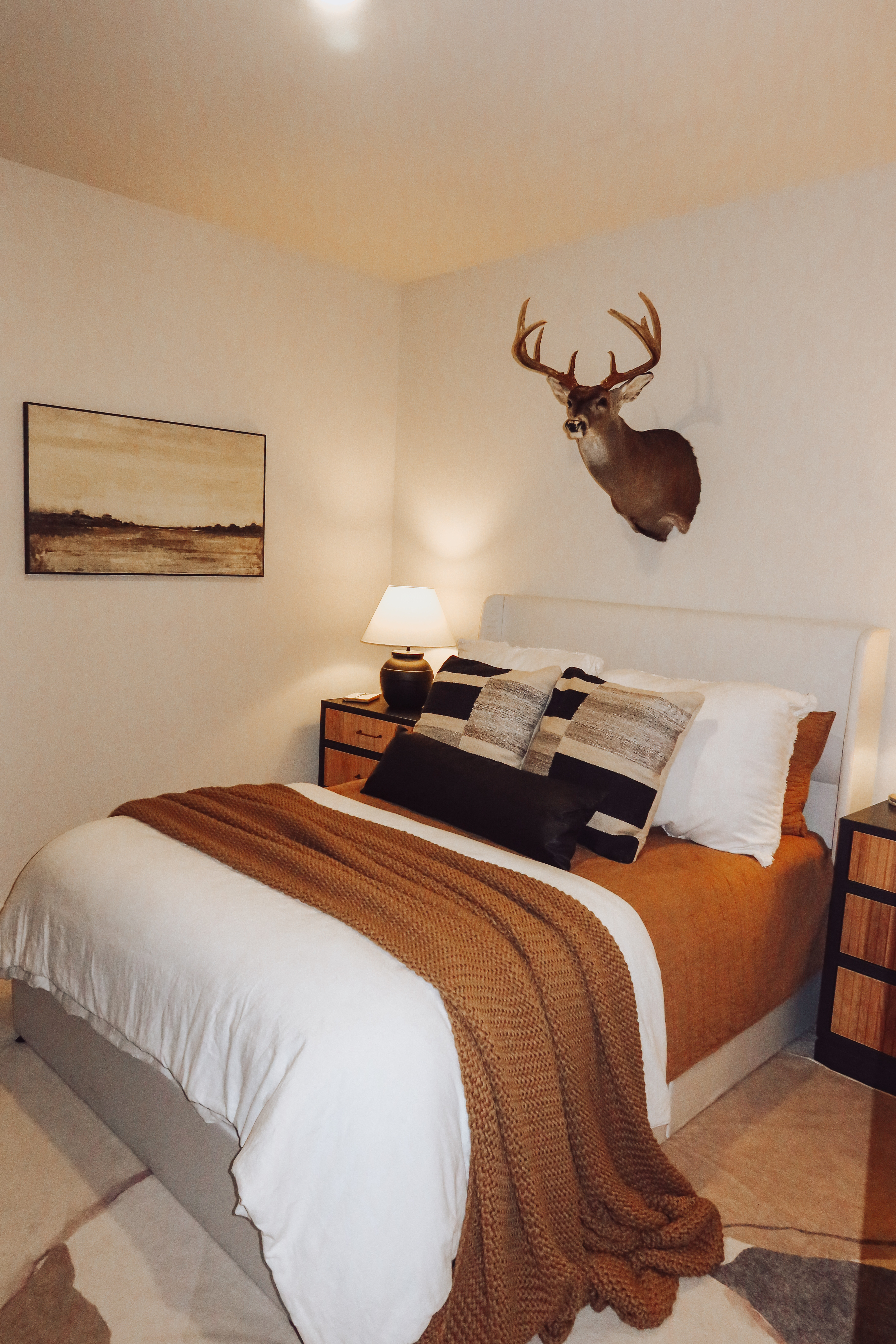 A cozy retreat for guests 🤎 Neutral layers, warm textures, and rustic touches make this space feel like home. 

 #LTKHome #LTKStyleTip