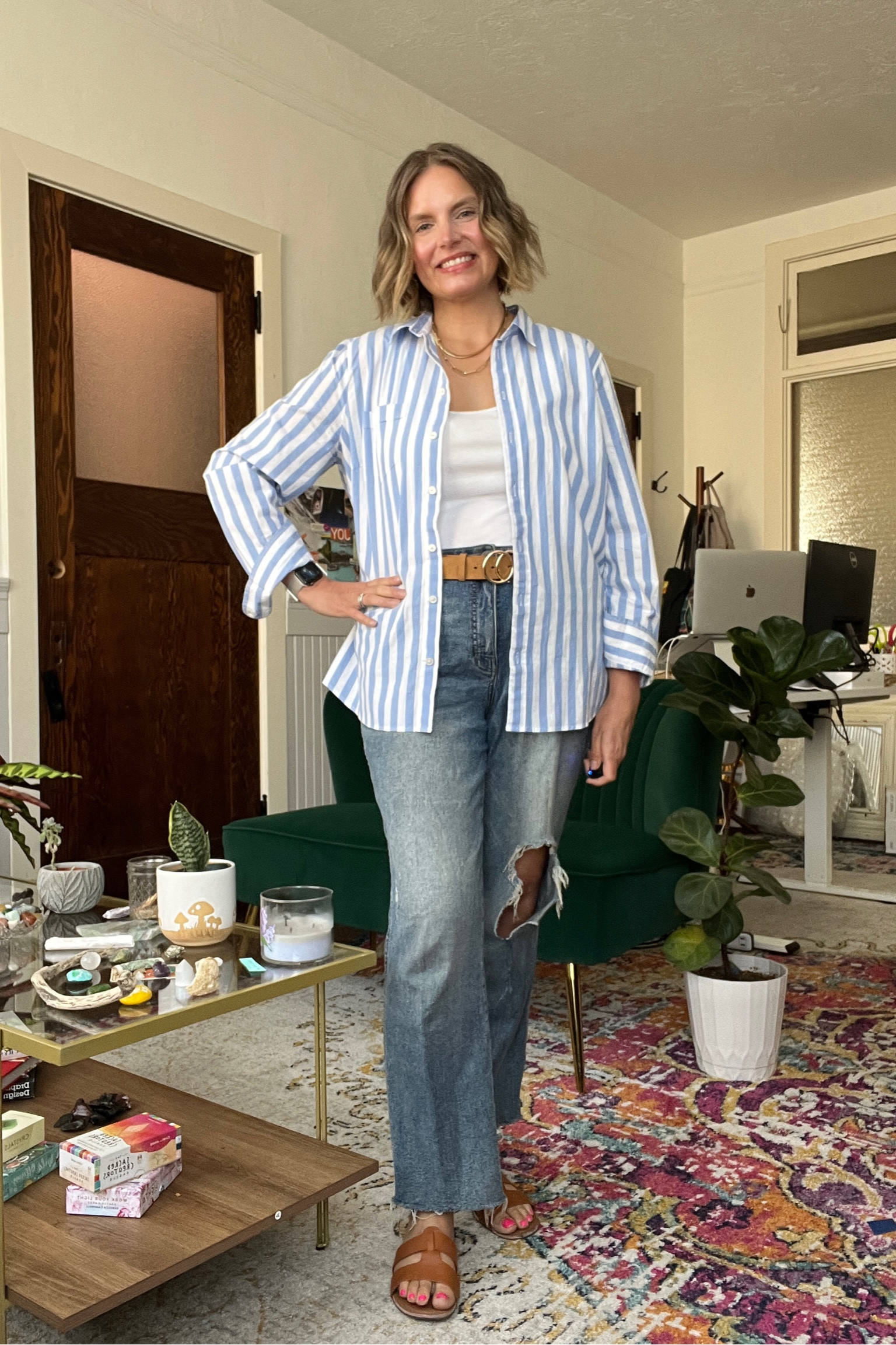 Outfit formula: striped button down shirt, white tank top, boyfriend, jeans, brown belt, and sandals

#LTKworkwear #LTKstyletip #LTKSeasonal