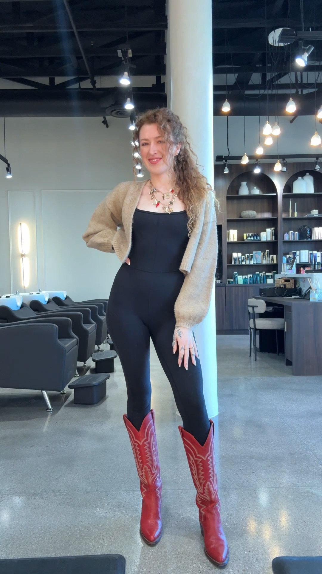 Red cowboy boots, black jumpsuit, cropped cardigan

#LTKShoeCrush #LTKSeasonal #LTKFestival