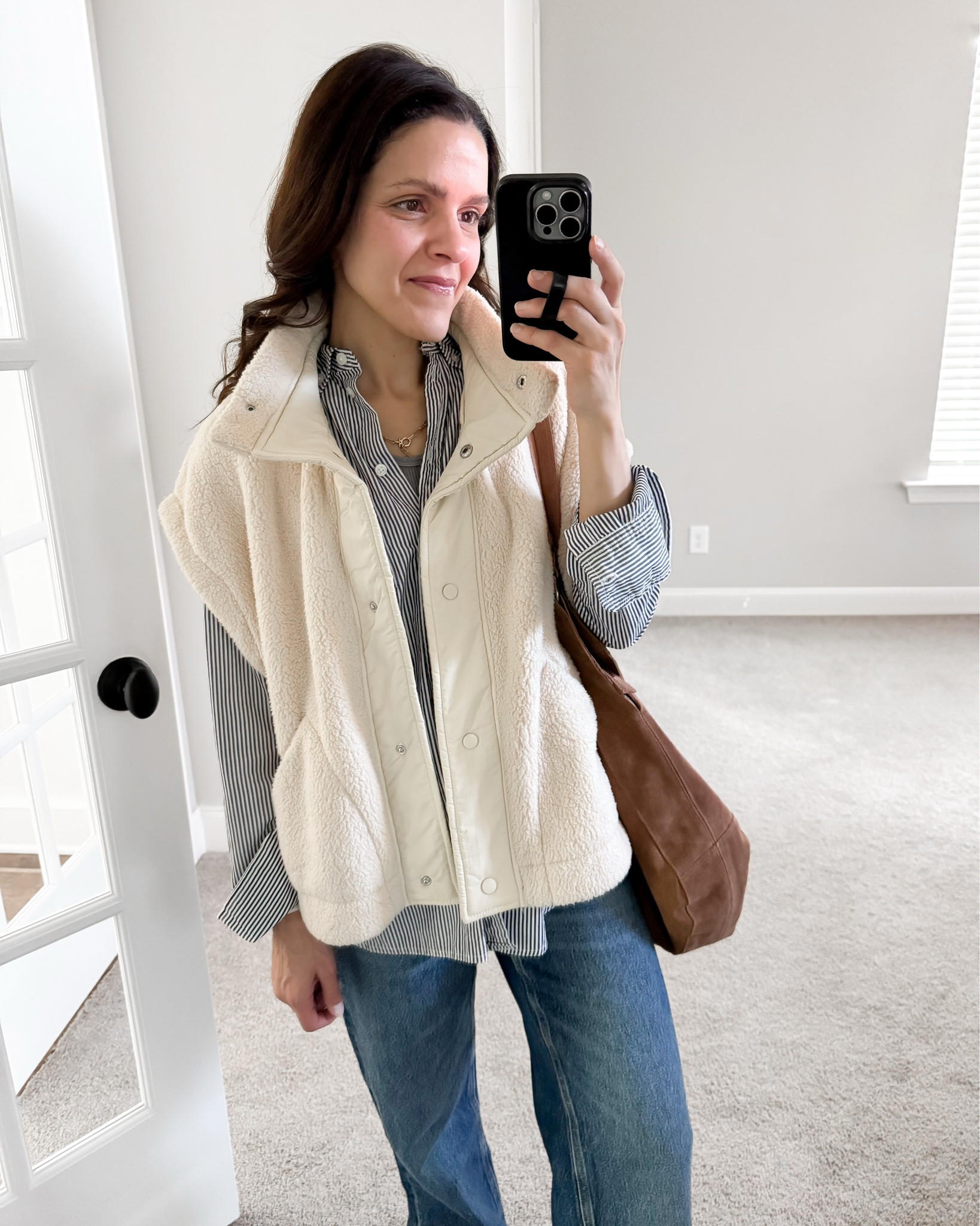 What I wore - Spring transitional outfit 

Striped button down - linked similarr Wide leg
Fleece vest - linked similar 
Wide leg jeans - wearing 25 short 
Ballet flats - tts 

#LTKStyleTip