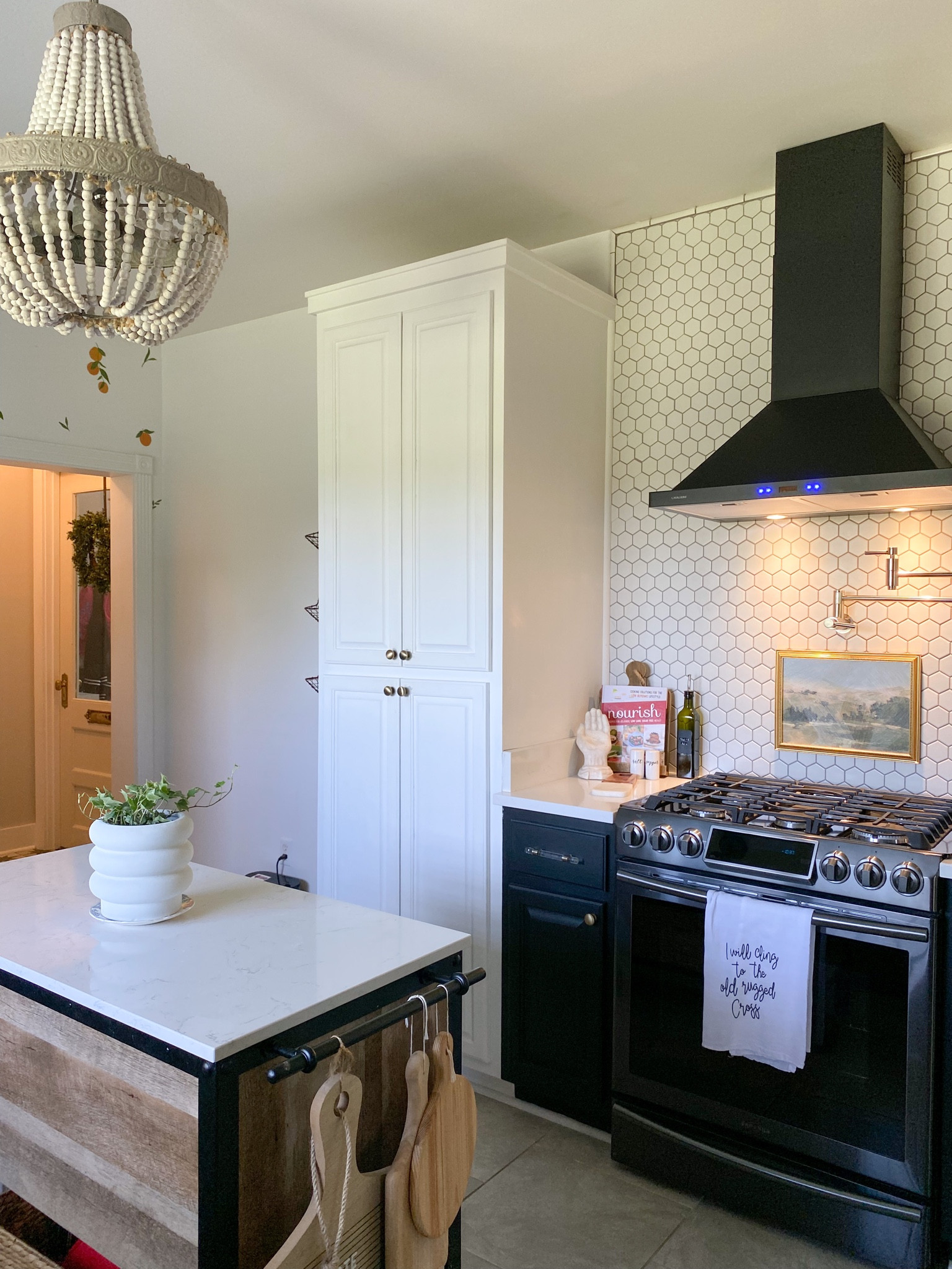 Bubble planter, black hood vent, wood bead chandelier, gold framed art, #modernorganic #moderndecor #kitchendecor #kitchenlighting #amazon 
Target kitchen island 

#LTKunder100 #LTKhome #LTKsalealert