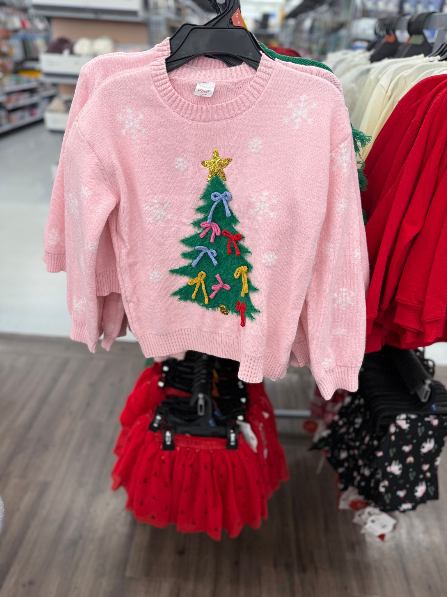 Festive and cute — this pink Christmas tree sweater from Walmart is perfect for the holidays! 💗🎄 

#LTKHoliday #LTKSeasonal #LTKKids