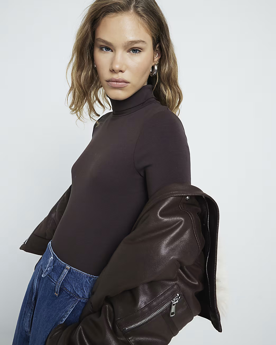 Brown Long Sleeved Roll Neck Bodysuit | River Island UK & IE