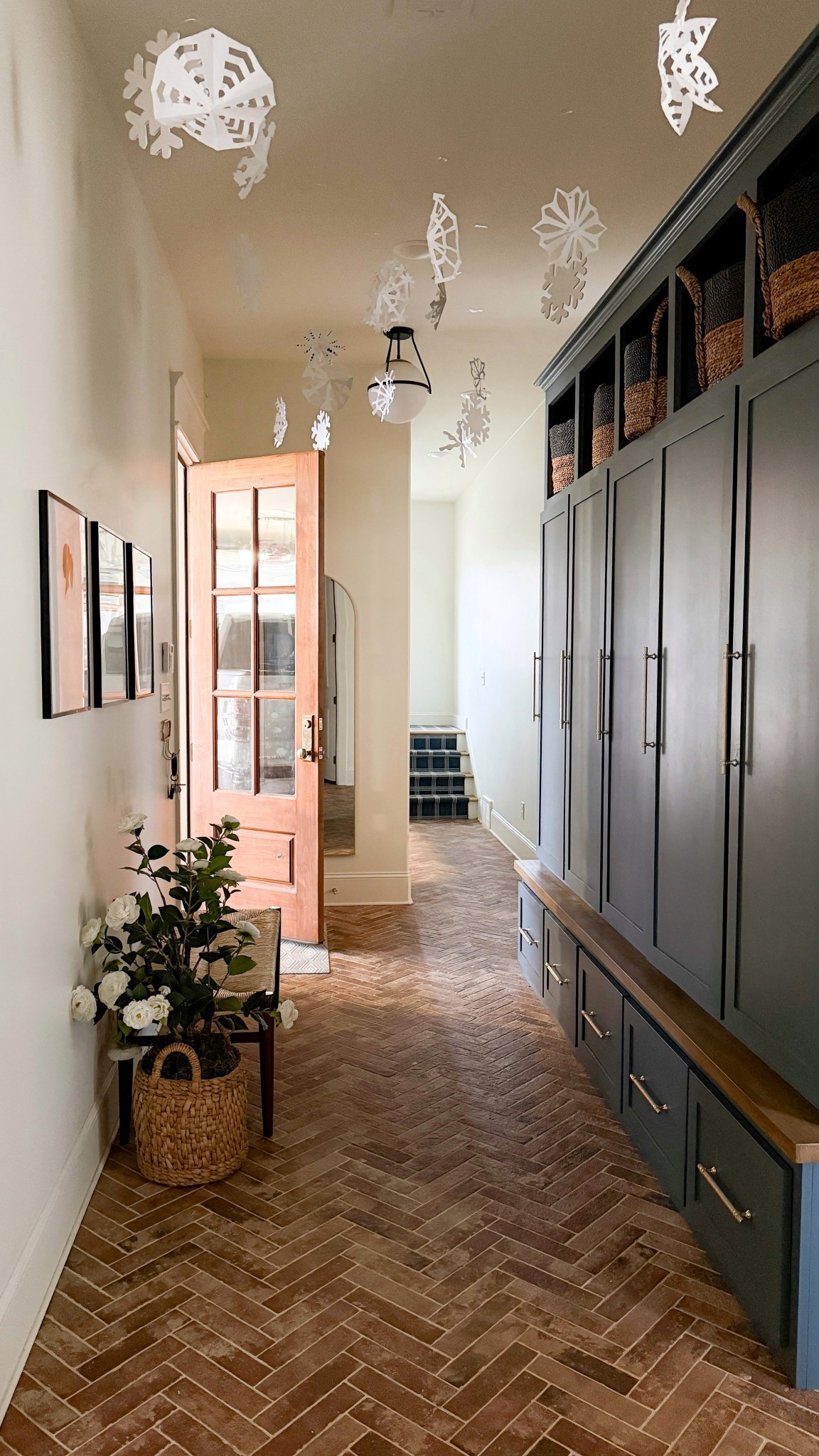 Just a small snow flurry in our mudroom brought to you by Christmas break crafting with my kids 🤍❄️

#LTKHome #LTKHoliday #LTKSeasonal