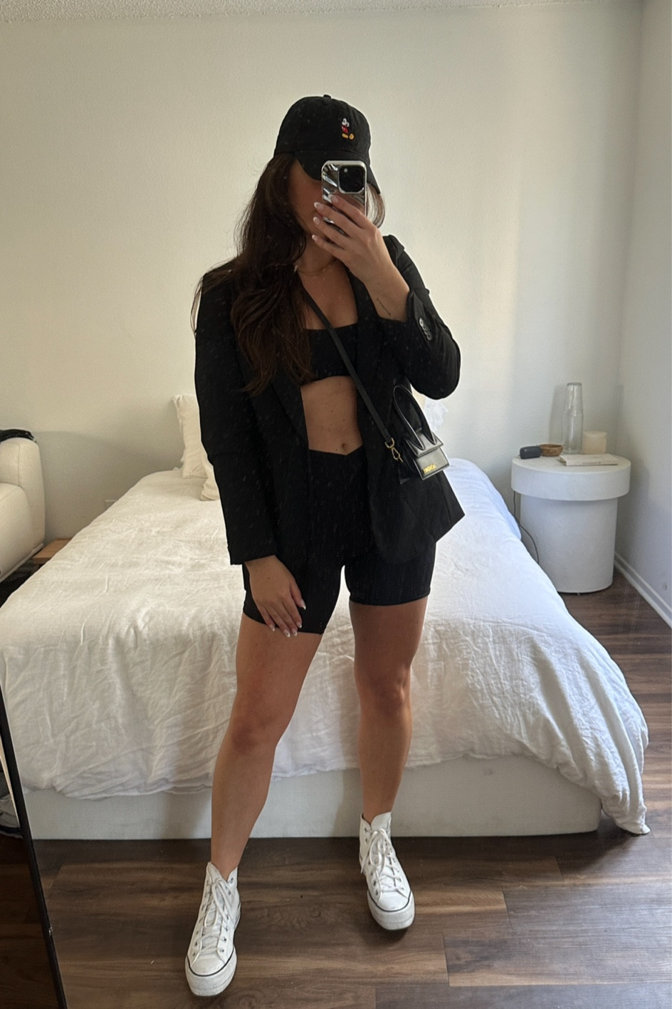 Disney Outfit Idea Six: Black H&M blazer, Amazon Sports Bra, Aerie Biker Shorts, white platform leather converse, Amazon Mickey Mouse hat.

#LTKstyletip #LTKtravel #LTKunder100