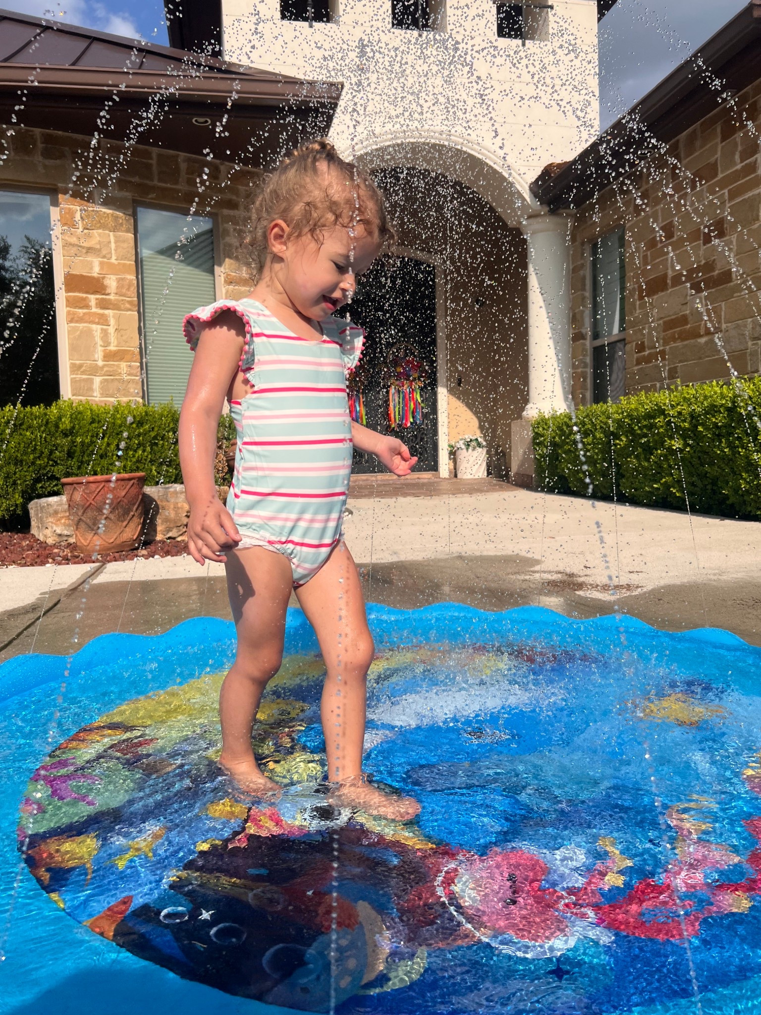 Summer must have, the splash pad at home! Her swim is reversible ( 2 in 1 yes please) and it comes with a swim tutu and bow ☀️ 

Summer time | summer fun | summer ideas

#LTKBaby #LTKKids #LTKSummerEdit