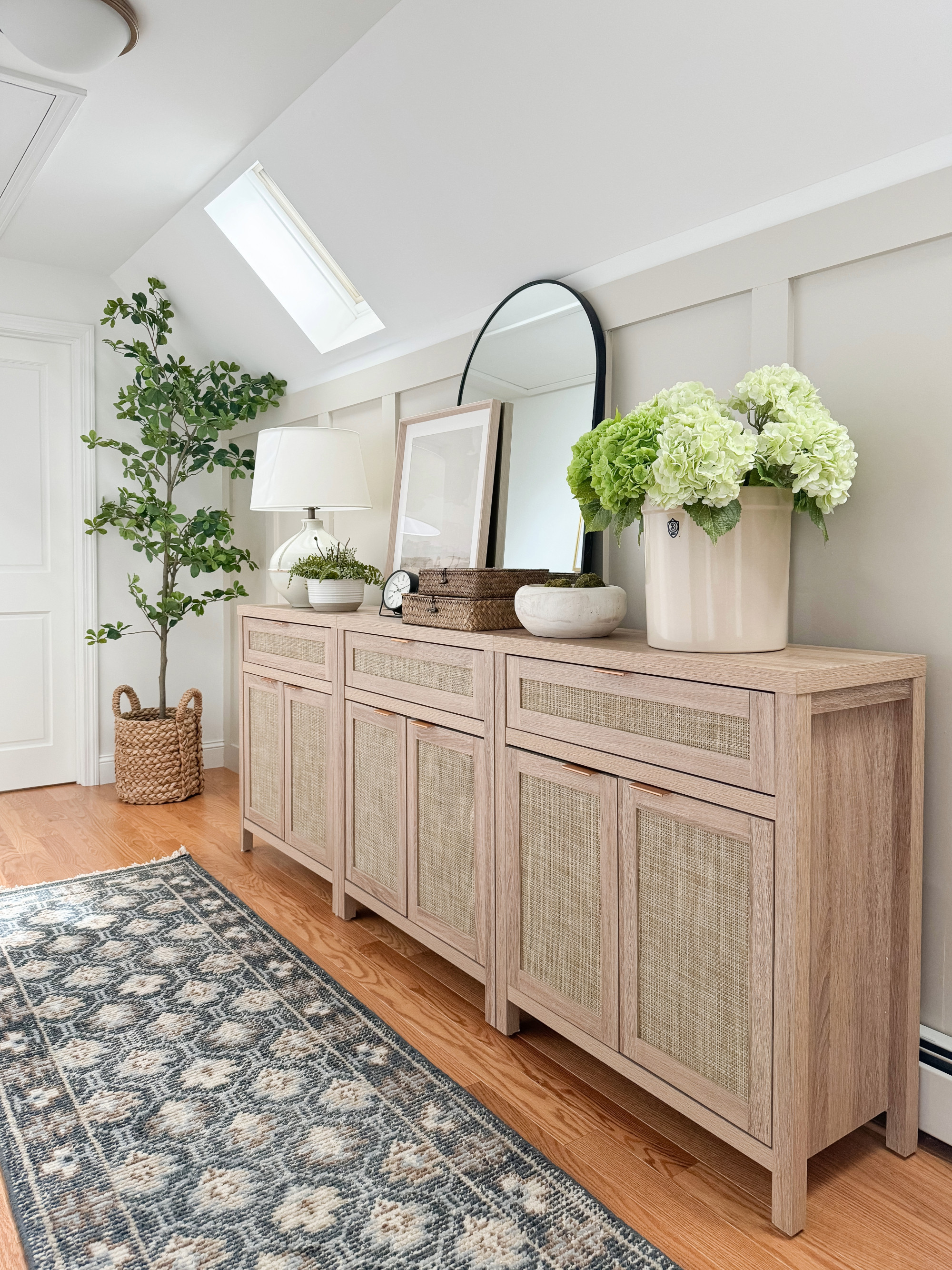 Rattan Cabinet Styling

coastal home, neutral home, faux hydrangeas, arch mirror, landscape art, faux tree, wayfair, runner rug, sherri calnan home 

 #LTKSeasonal #LTKHome #LTKStyleTip