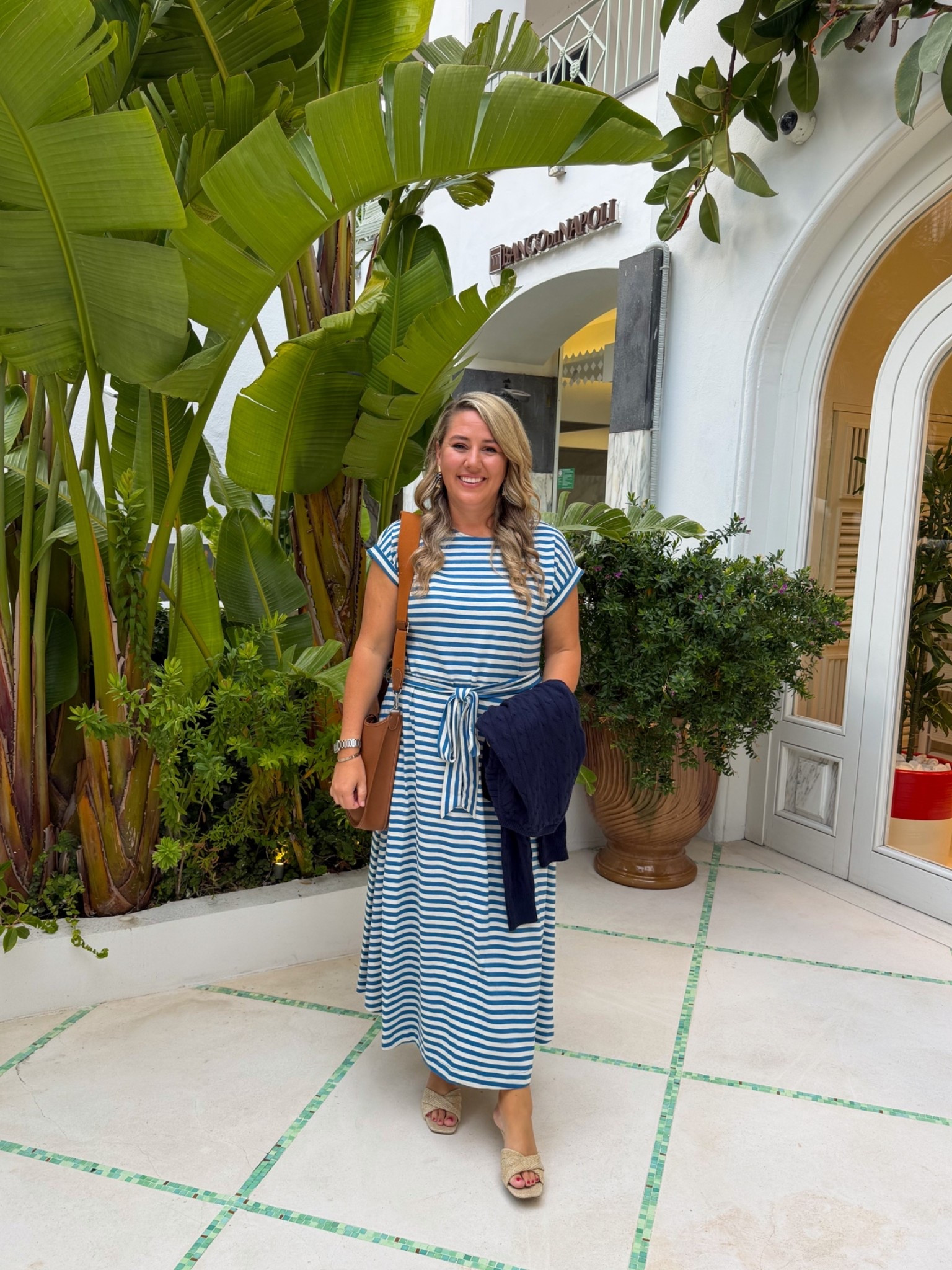 Last night’s outfit for dinner in Capri! This blue striped dress is super comfy and packed with very few wrinkles. I’m in the Large Tall (I’m 5’9”) and it was roomy. These shoes are so comfy but not the greatest for cobblestone hills in Italy 😬 The cable knit cardigan came in handy for the cooler evenings! @Boden (US)

#LTKTravel #LTKMidsize #LTKTall #LTKSaleAlert #LTKOver40