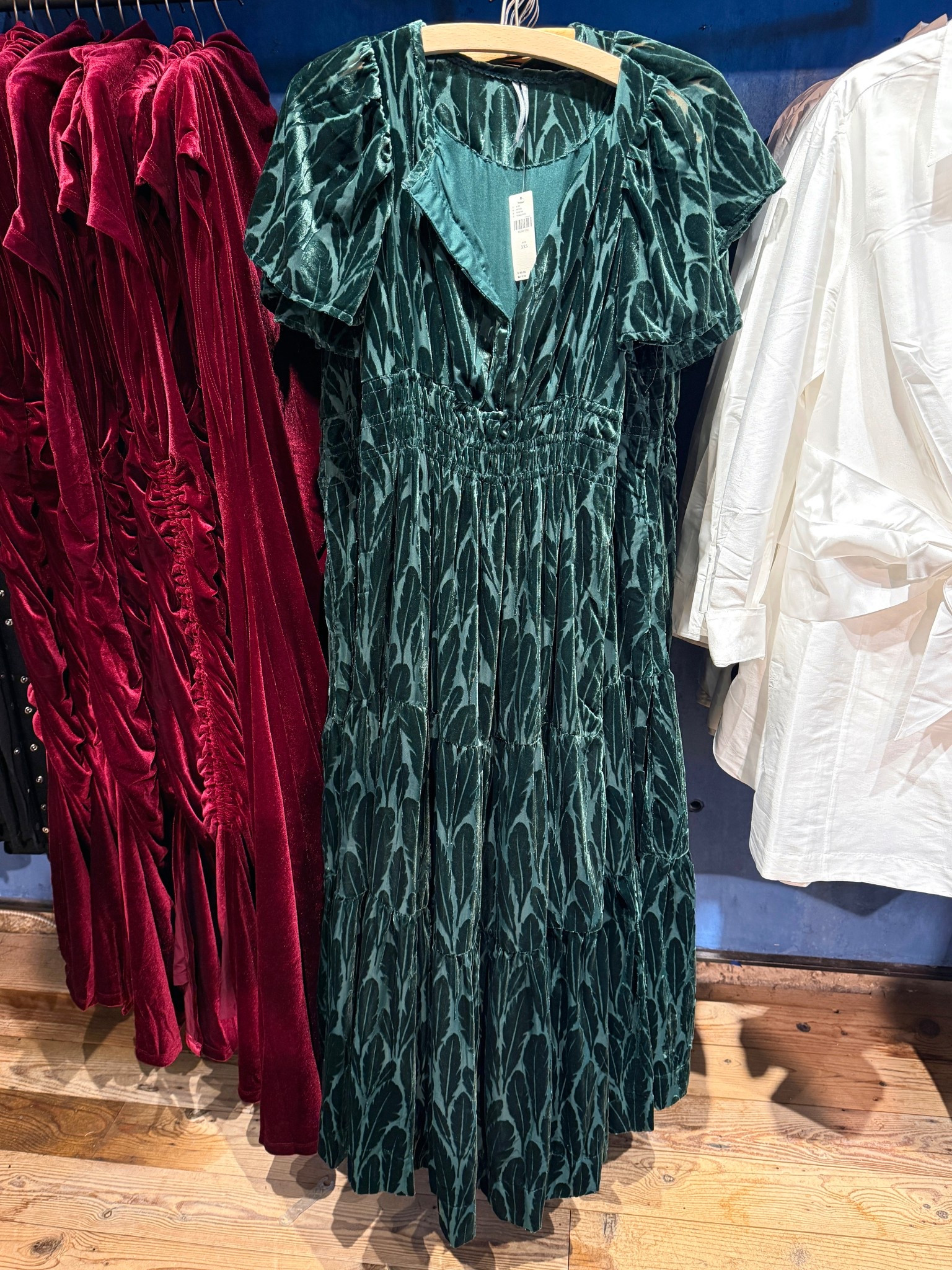The Somerset Velvet Maxi Dress — an Anthropologie best seller for a reason! 💚 This rich green velvet is perfect for holiday parties, with its flattering A-line silhouette, flutter sleeves, smocked waist, and tiered skirt. Effortless, elegant, and so comfortable with side pockets! Linked more festive party dresses for the season!🎄#Anthropologie #HolidayDress #Dress 

#LTKParties #LTKHoliday #LTKGiftGuide