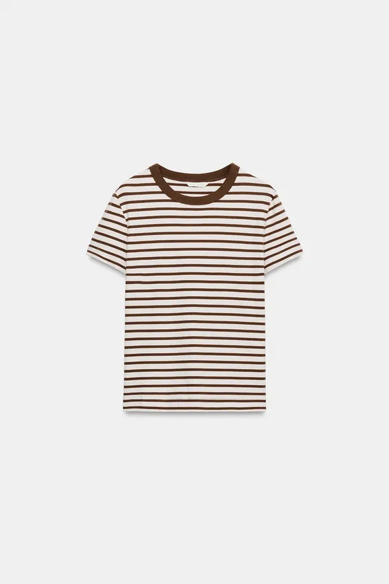 REGULAR FIT - ROUND NECK - REGULAR LENGTH - SHORT SLEEVE

T-shirt crafted from stretchy, flexible knit fabric with a compact, plush and opaque finish. Featuring a round neck and short sleeves. Straight hem. | Zara UK