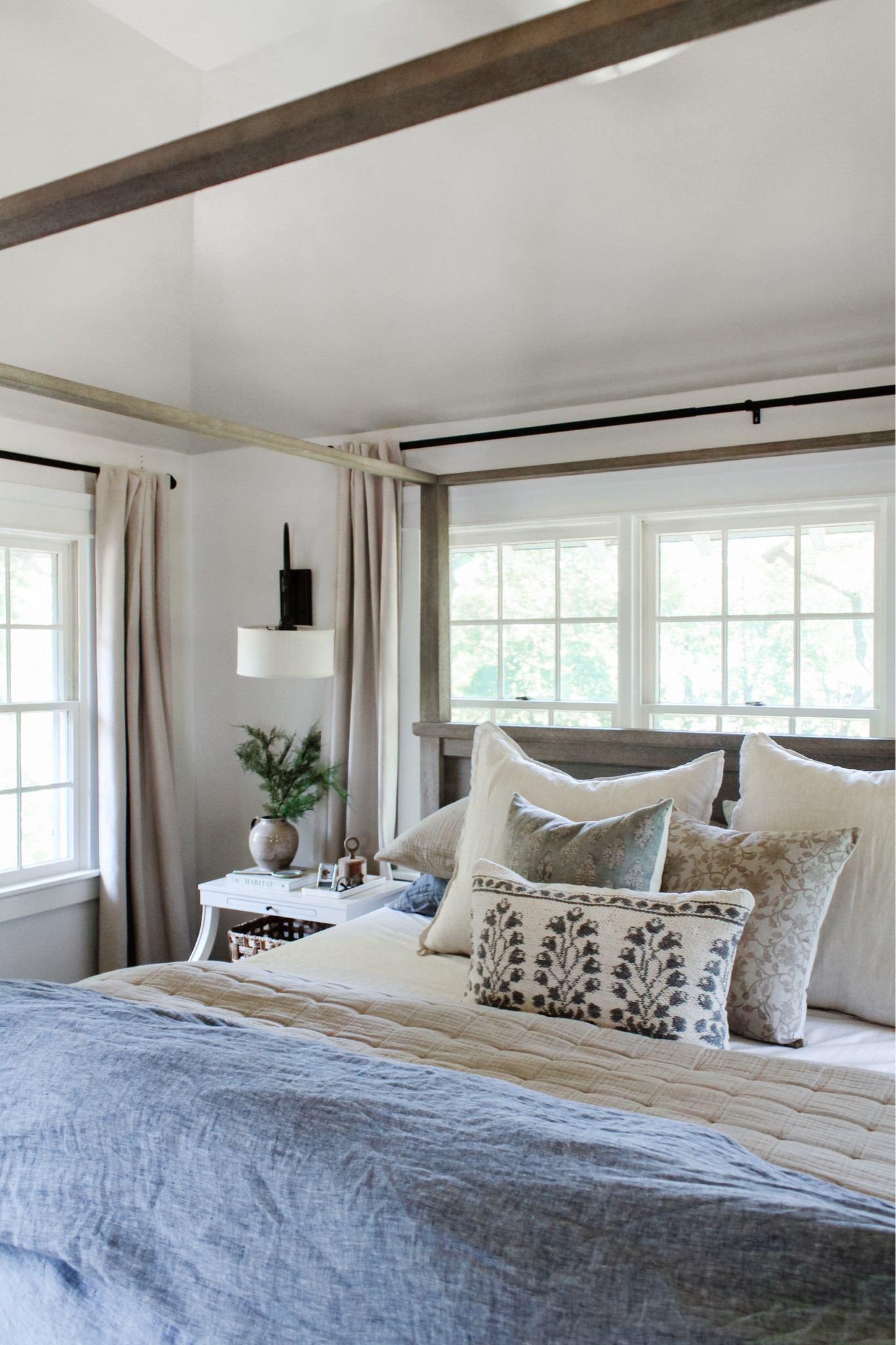 This quilt has exceeded my expectations ✨ Sharing more about it and a few other items I’m loving at the moment over on stories + the blog! Shop via the link in bio.
•
•
•

4 poster wood bed, natural tone wood bed, canopy bed, linen duvet, stripe euro shams, floral decorative pillow, bed pillows, pillow inserts, cotton gauze quilts, layered bedding, nightstand decor, white two shelf nightstand, affordable furniture, quick ship furniture, swing light, nightstand wall light, affordable curtain, neutral bedroom, bedroom decor, black curtain rod, vintage decor, Target home, woven basket, lumbar pillow, floral throw pillow cover, blue bedding  

#LTKunder50 #LTKhome #LTKsalealert