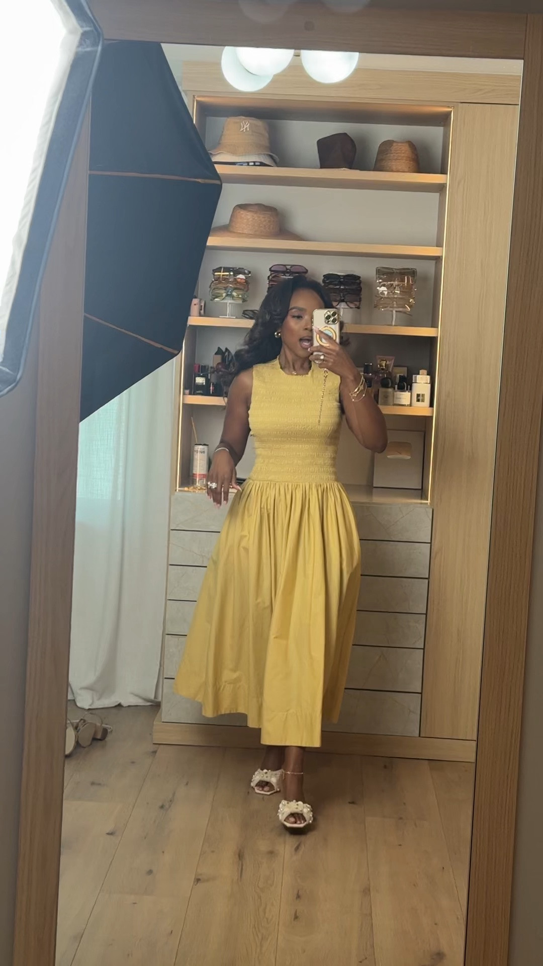 Hi Babes! 💛✨

This buttery yellow midi dress is giving effortless elegance! The smocked bodice is so flattering, the skirt has the prettiest movement, and the color is absolutely perfect for summer. Just add a cute heel or sandal and you're ready for anything!

✨ Fit Details:
• Wearing a size Small
• Smocked bodice for a flattering fit
• Midi length
• Lightweight cotton feel
• True to size
• Pearl statement heels to finish the look

☀️ Where to Wear:
• Bridal shower
• Baby shower
• Sunday brunch
• Garden party
• Vacation dinner
• Summer wedding guest

Everything is linked below!

xx, Kira | IG: KirasFashionFinds

Measurements:
Kira: 5'4" | Size Small | 140 lbs