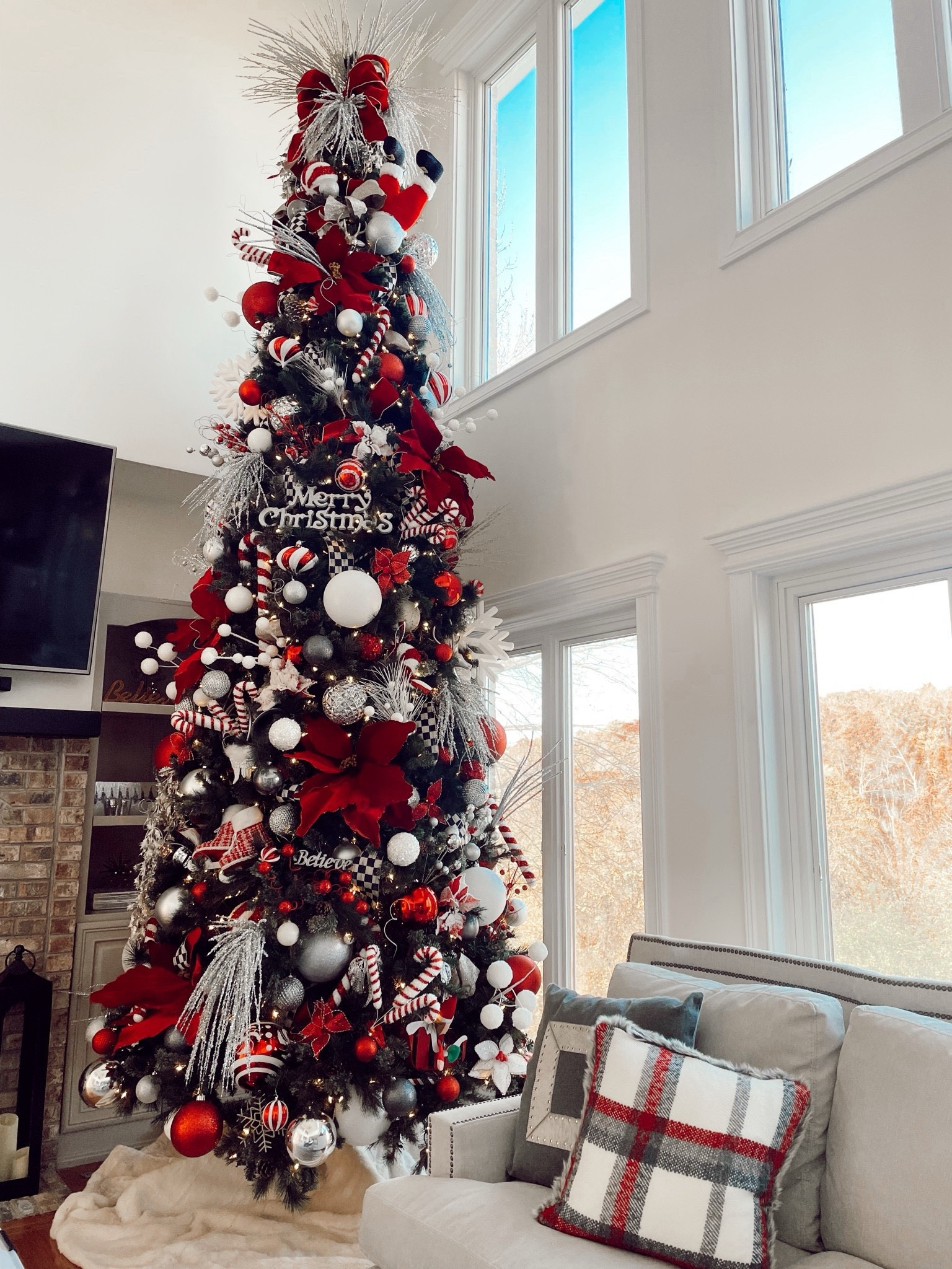 sharing details of our 14 ft faux Christmas tree / PB pillow covers & tree skirt / MC checked ribbon

#LTKHoliday #LTKhome #LTKSeasonal