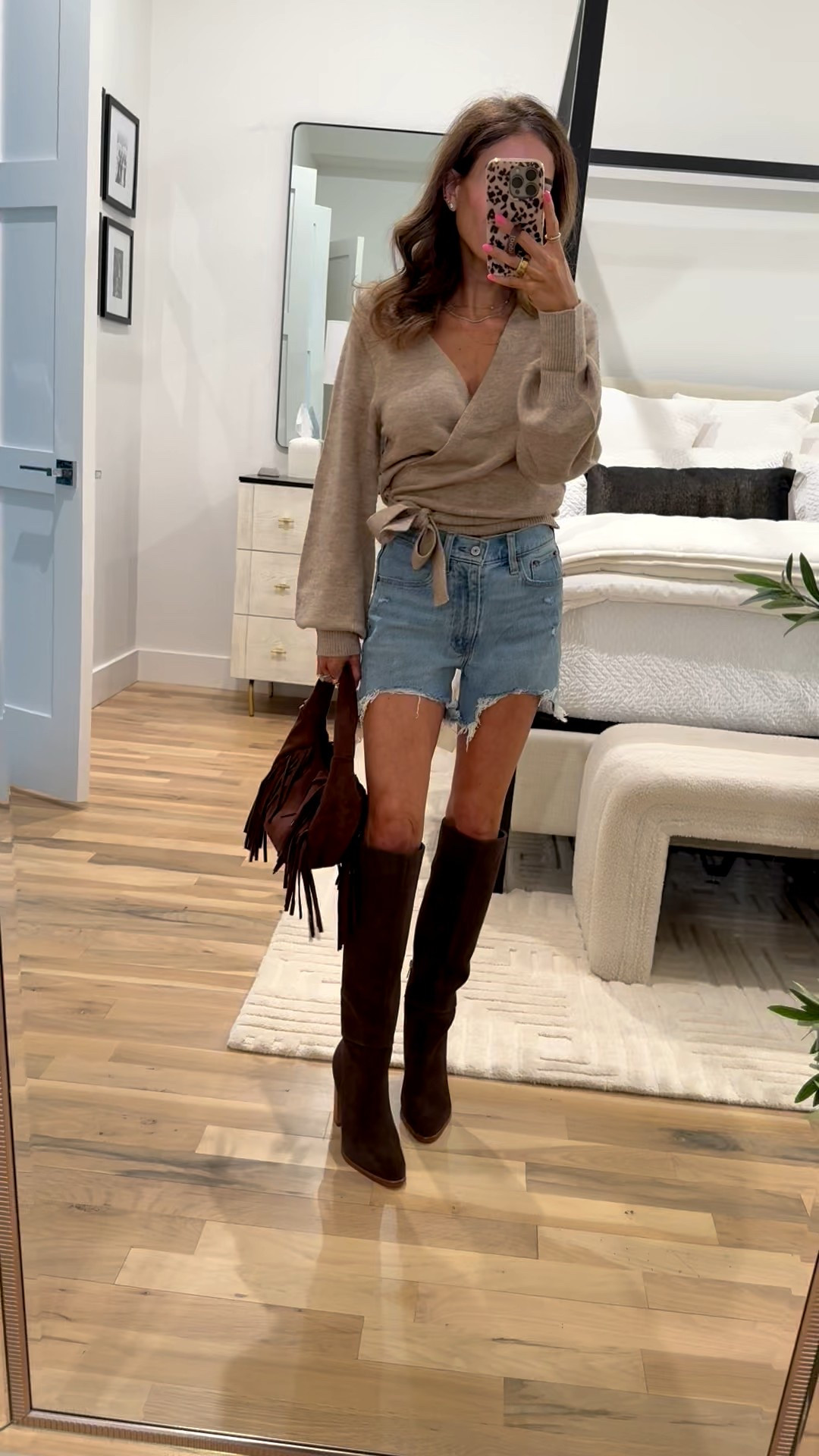 Spring transitional outfit idea wearing these brown suede boots with a neutral wrap sweater and denim shorts 

#LTKPetite #LTKSeasonal