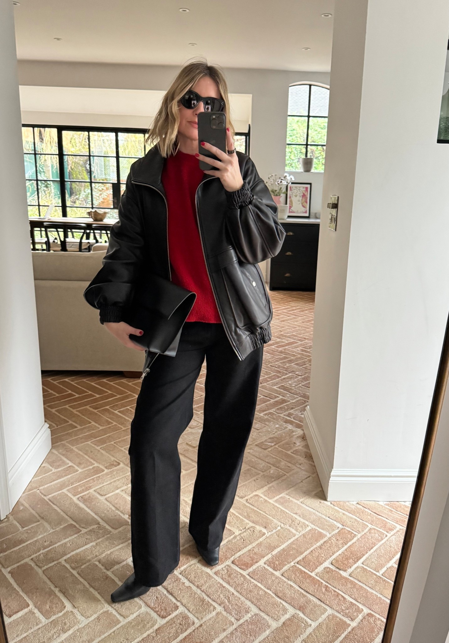 Red Knit + Baggy Jeans + Leather Jacket 

#LTKFashionMonth #LTKspring #LTKuk