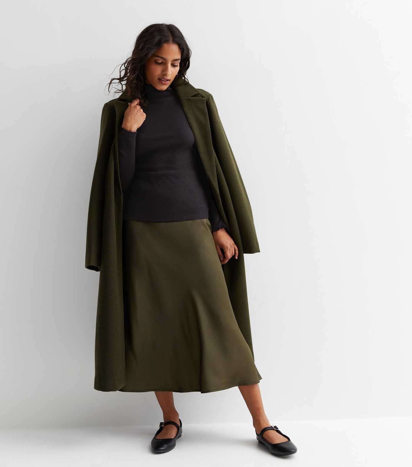 Petite Black Ribbed Roll Neck Top | New Look | New Look (UK)