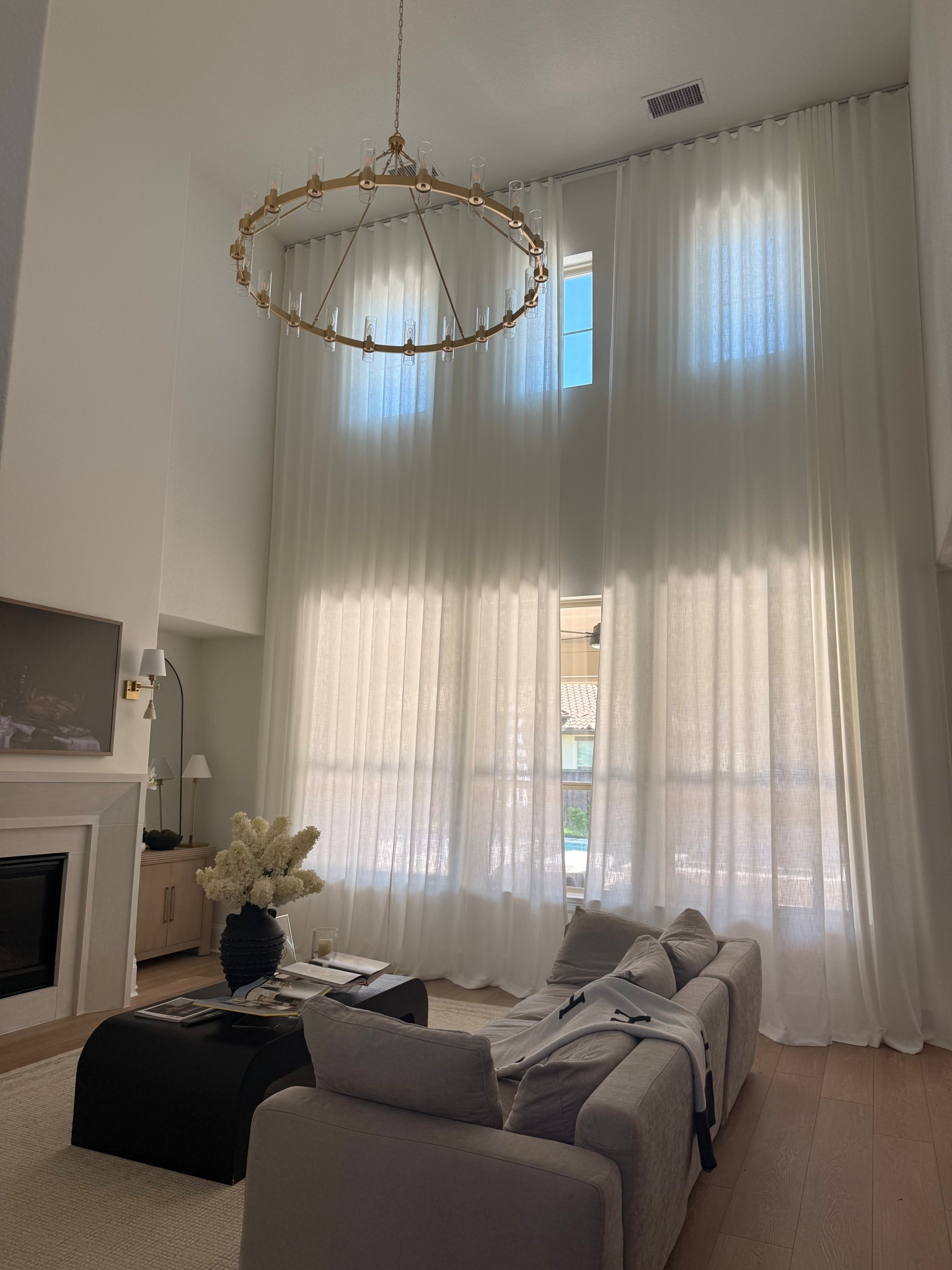 All the details about my curtains! ⬇️

Custom Ripple Fold Drapery with Lora Track
Variant: Kyla | Linen
Kyla Color Select: Warm White K1009
Total Coverage Width (built in 200% fullness): 192 
Length (Height) in Inch: 236 
Number of Panels Per Total Width: Pair (two equal panels) 
Hanging Header Style: Tape Buckle Header 
Mount Type: Ceiling
Size(Lora Track): X-Large 12ft-18ft 
Lining Type: Unlined
