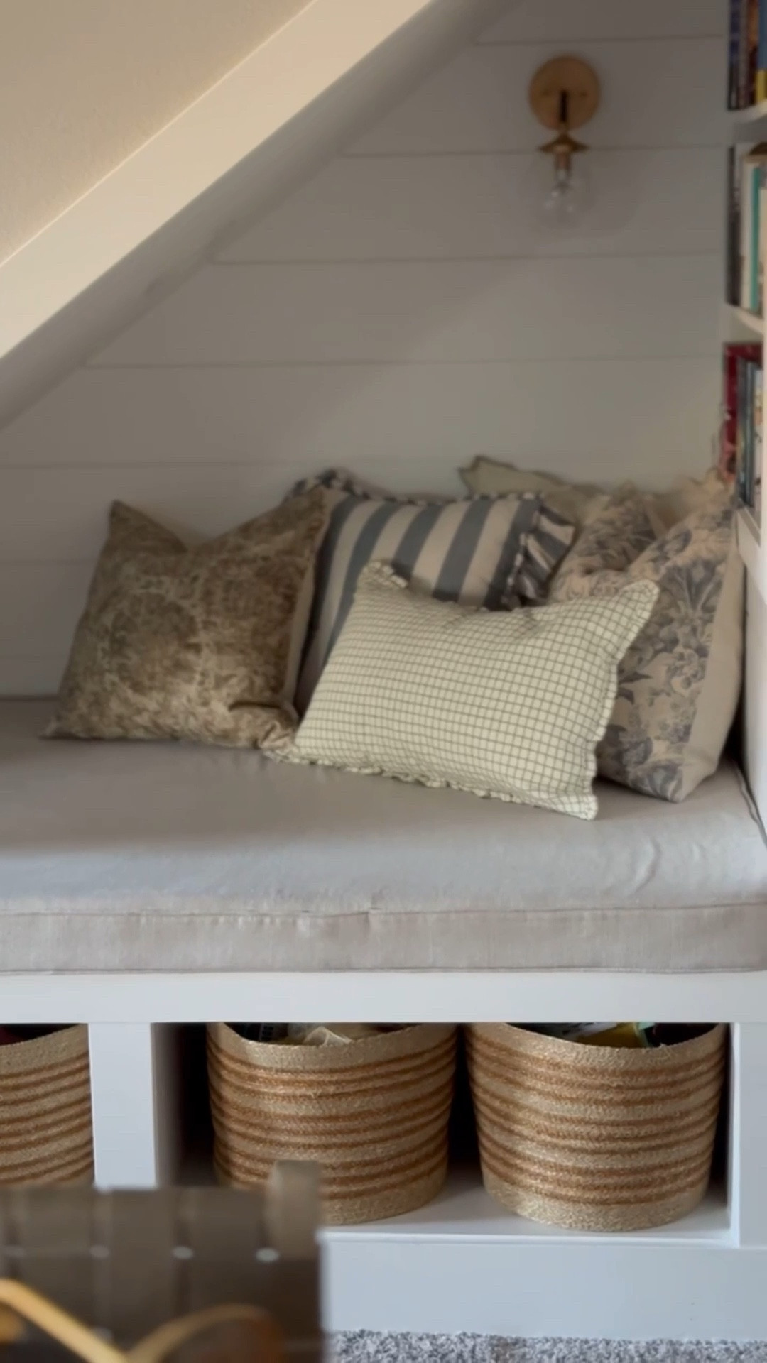 Our cozy little basement corner! I’m loving these throw pillows paired together right now for spring. A mix of florals, geometric patterns, ruffles, and fringe! 

#LTKHome #LTKStyleTip