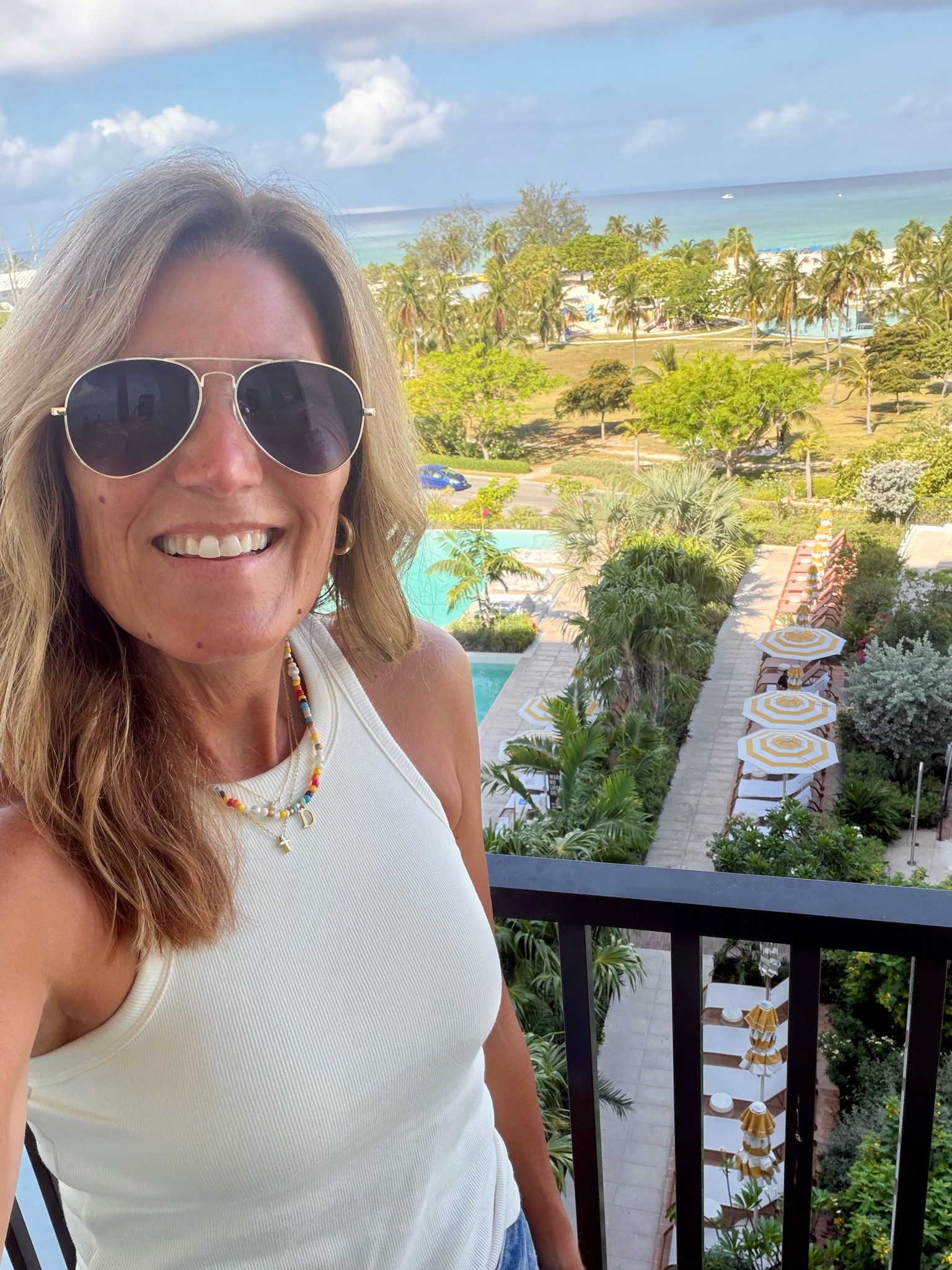 I always bring one of these tanks when I travel 🏝️



#LTKTravel #LTKOver40 #LTKootd