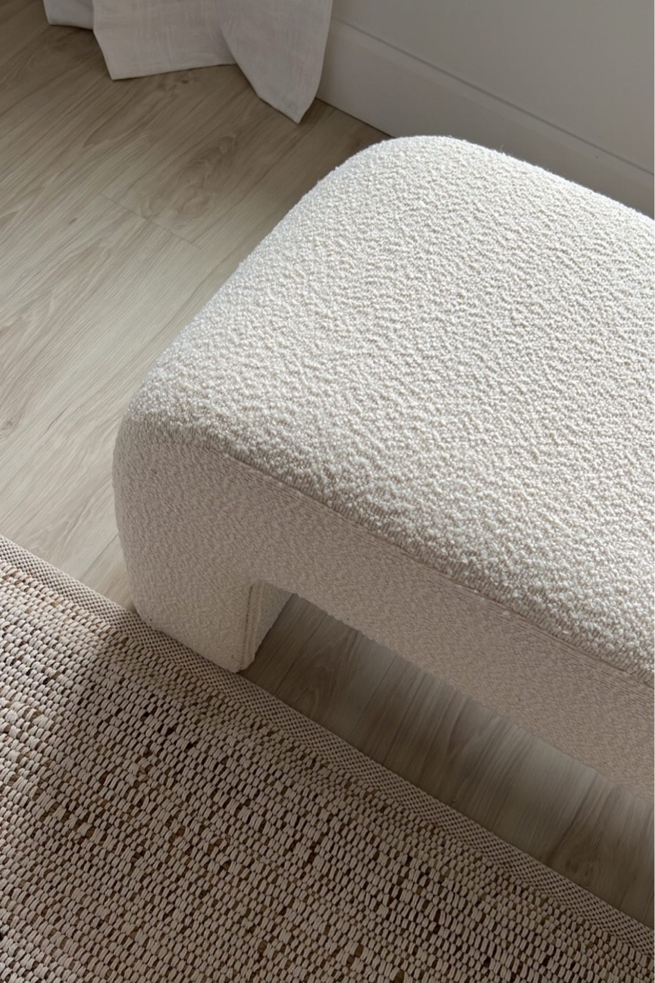 Boucle bench. Fully upholstered, waterfall shape, textured arch rounded edge bench. Off white. Solid wood frame. Natural jute cotton mix rug living room furniture 

#LTKhome #LTKFind #LTKsalealert