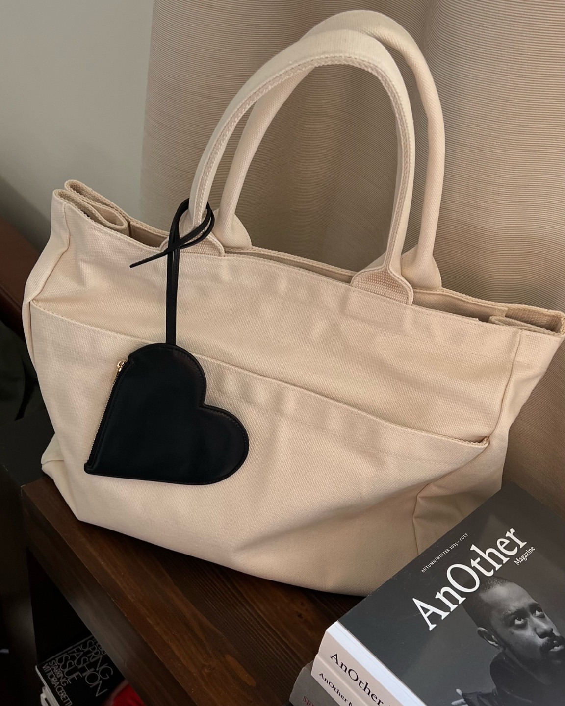 Canvas tote bag from Uniqlo C styled with a heart coin pouch from Jil Sander  

#LTKfindsunder100 #LTKstyletip #LTKitbag
