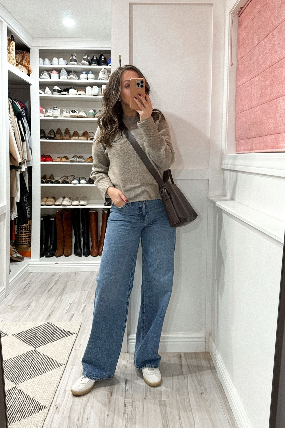 Been on the hunt for a pair of relaxed baggy but chic jeans and love these.  I got my true size in jeans. Just barely roomy in waist but smaller size would be tight in butt.
Sneakers tts 
Sweater tts - wearing xs.  

