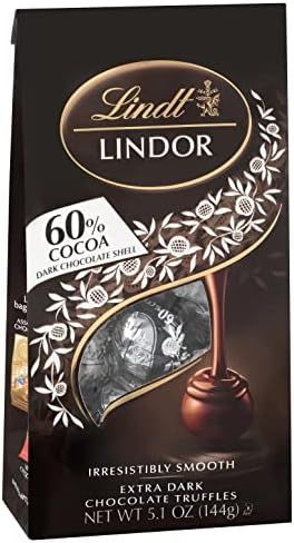 Lindt LINDOR 60% Extra Dark Chocolate Truffles, Dark Chocolate Candy with Smooth, Melting Truffle... | Amazon (US)