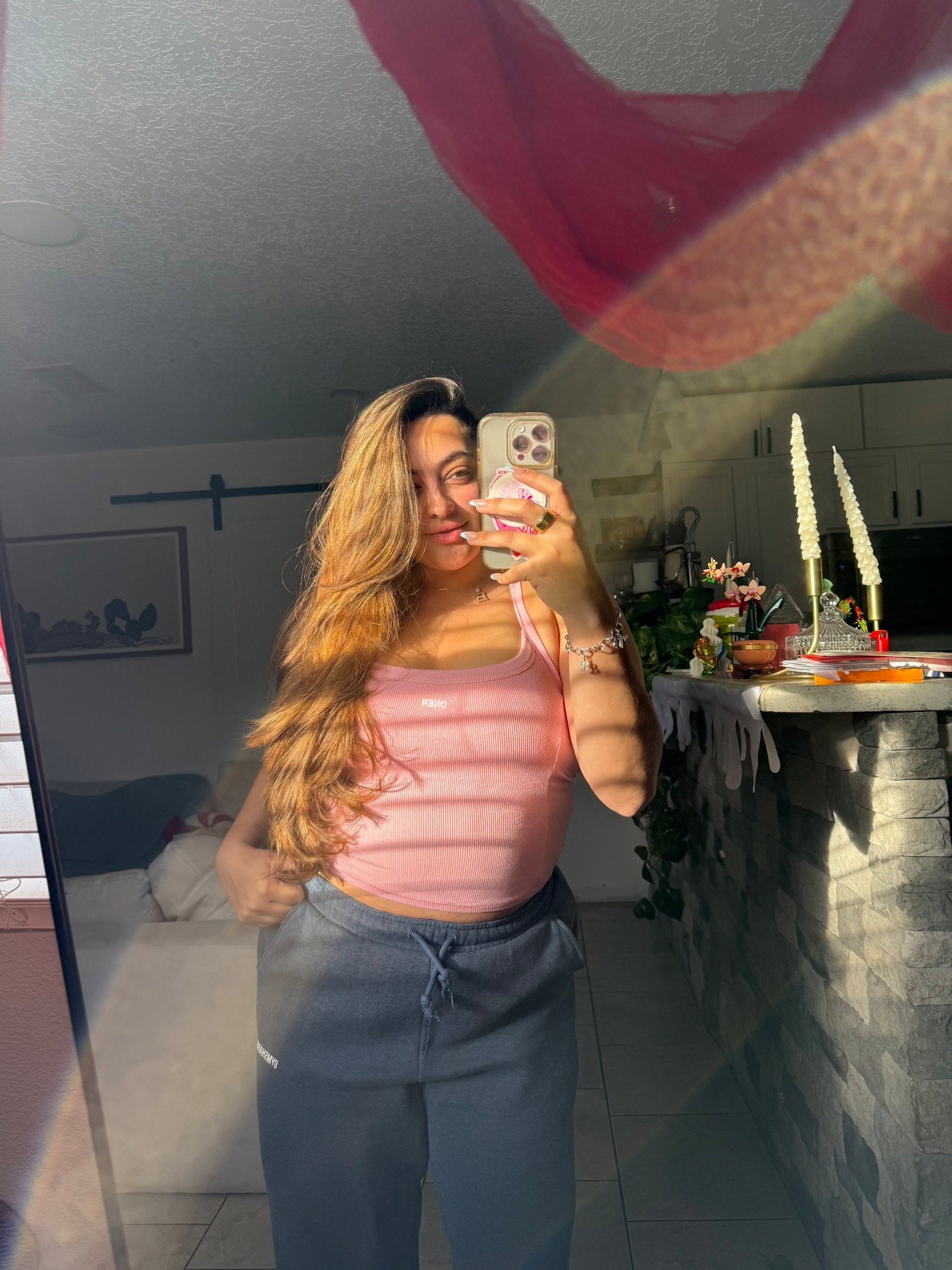 obsessed w my overnight blowout rods !!! going to the gym w/ fresh hair feels illegal 😂 but we got to get the work in before the new year starts! my top is oner active in a size M and my sweats are gymshark in a size M as well ! 🌟🫶🏼