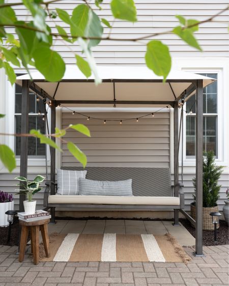 Patio, patio furniture, outdoor furniture, canopy swing, porch swing, covered swing, patio decor, faux plants, outdoor rug, outdoor pillows 

#LTKunder100 #LTKfamily #LTKhome