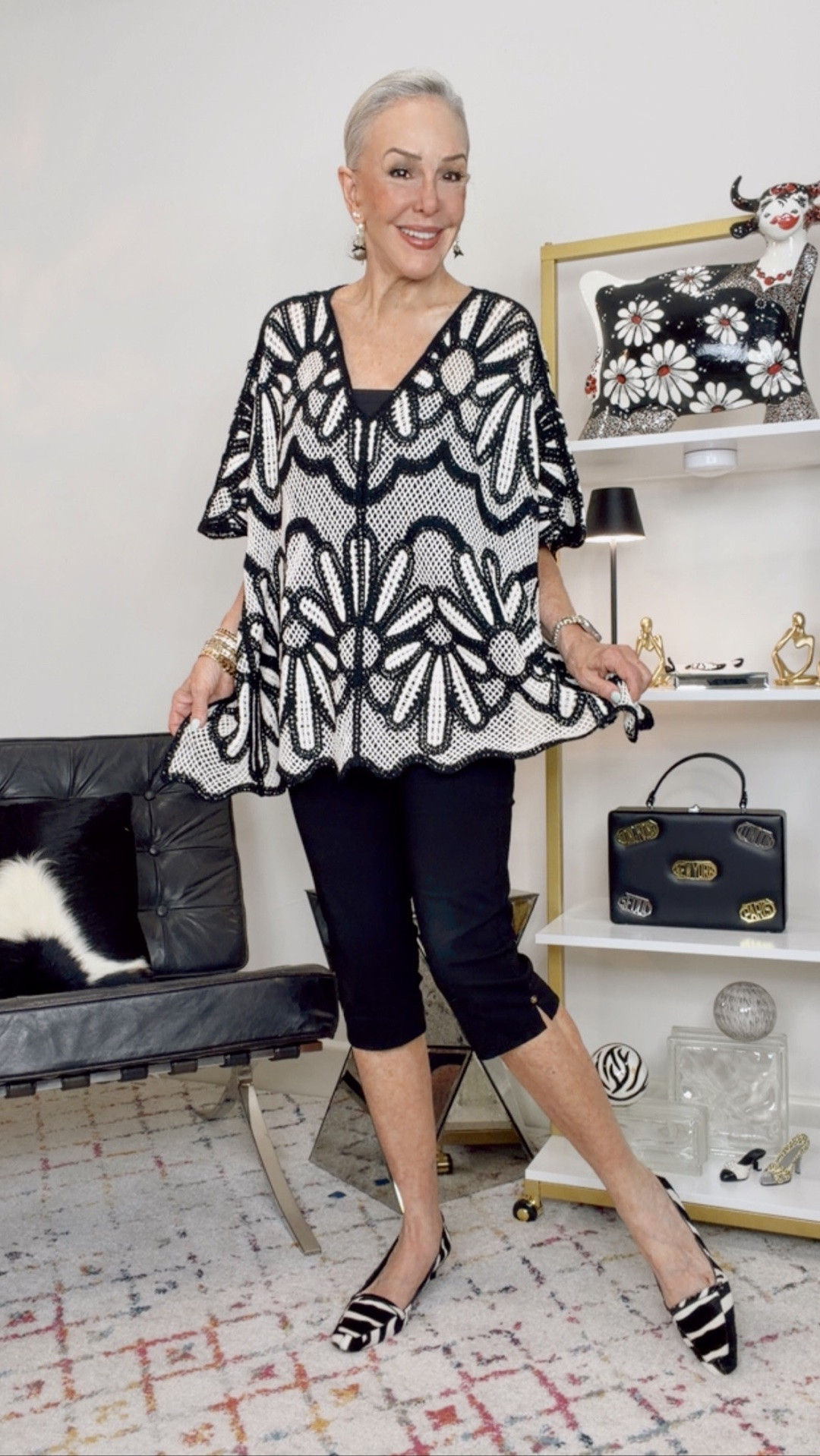 Chico’s crochet lac floral poncho.
Brigette capris that I call a pedal pusher is trending big time. That 50-60’s style inspo. Comes in other colors. I bought all the colors. Perfect for date night, lunch, vacation and more. Wear over a sheath dress or a pencil skirt. 
I wear a size 0 in Chico’s unique sizing. Fits like a size 6

#LTKOver40 #LTKgrwm #LTKootd