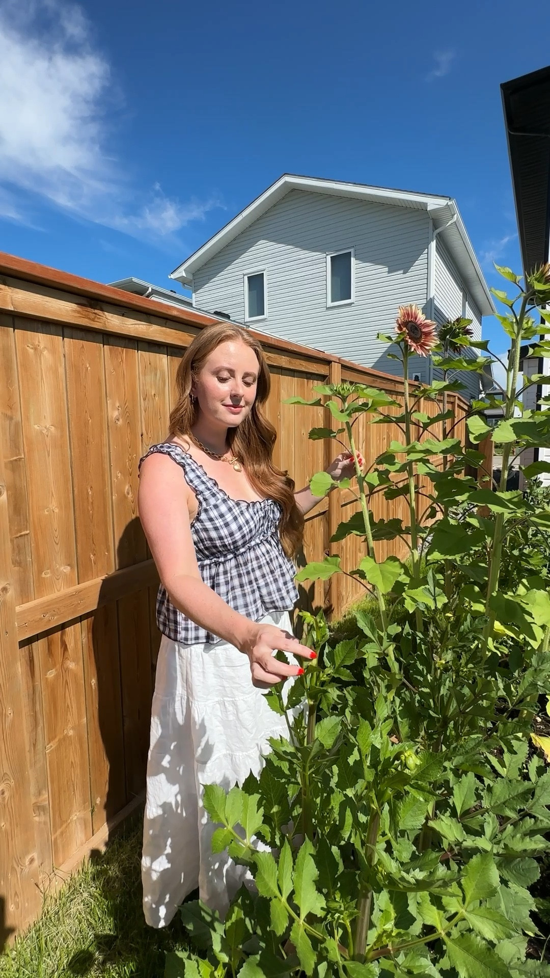 Garden tour fit 🌿 A flowy white skirt from Aritzia and a gingham tank top from American Eagle—simple, breathable, and so summery. I added my go-to gold necklace from Amazon to finish the look. Everything is comfy, practical, and cute for hot days in the garden (or just romanticizing your morning coffee on the porch).

garden outfit, summer outfit idea, Aritzia flowy skirt, white maxi skirt, American Eagle gingham top, casual summer look, garden style aesthetic, feminine summer outfit, Amazon gold necklace, cute gardening outfit, outfit for hot weather, Canadian summer outfit, soft romantic outfit



#LTKsummer #LTKcanada #LTKmidsize